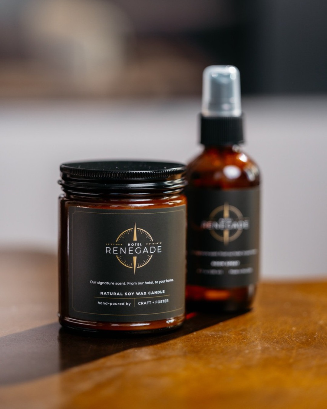 The scent you ask about, yours to take home. Our signature candle and room spray bring the atmosphere of Hotel Renegade beyond the stay. Warm, inviting, and unmistakably ours, it’s the finishing touch that lingers long after check-out.
Looking for more? We offer a selection of in-room favorites for purchase, from plush robes and Hunter bath products to pens, champagne glasses, and wine sleeves.
Available at the front desk. Take a little Renegade with you.