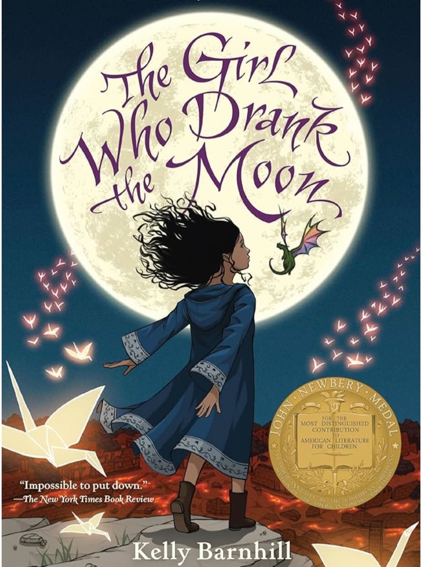Next on my list of favorites—The Girl Who Drank the Moon by Kelly Barnhill
This one completely swept me up. It reads like modern folklore, both lush and whimsical, but also with a deep sense of foreboding.
Within a fantasy context it explores the intense and unbreakable bonds between birth parents and the children who are taken from them, as well as the loving and equally as strong relationships among members of adoptive or chosen families.
What I love most is how much it trusts its readers. It holds space for big ideas—love, grief, truth, control—without losing that sense of wonder that makes middle grade so special.
This is one I’ll keep pressing into hands. It’s a beautiful read for both kids and grown-ups- basically anyone who wants to feel a little bit of magic again.
#MidsummerBooks #SpringBreakReads #StaffPicks #MiddleGradeMagic #IndieBookstore