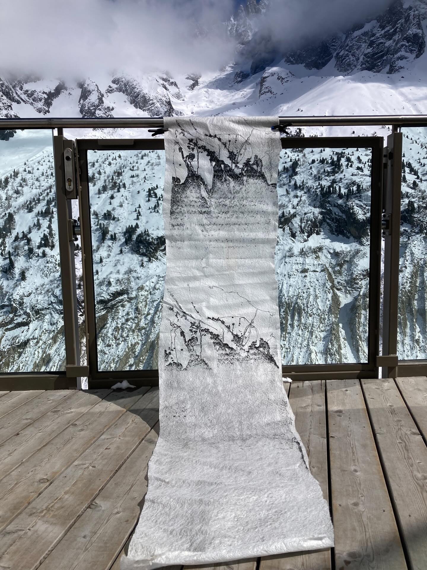 Screen print of the moraine in the background. Printed on textile for gravel. Interesting the way the print has accepted areas to reveal. Come full circle from drawing on site to installing the print in its natural habitat.#screenprint#lateralmoraine#pleinairartist#chamonix#merdeglace