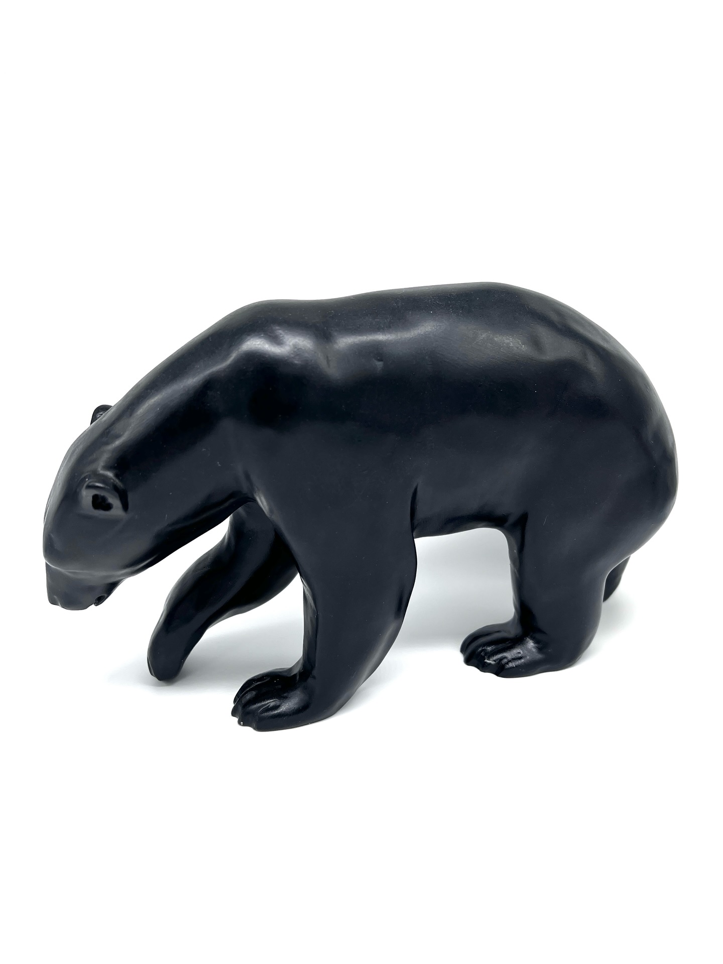Inuit Carved Polar Bear by Bill Nasogaluak (b. 1953)
Tuktoyaktuk, Northwest Territories
A beautifully carved polar bear in deep black stone, signed and dated 2007. The form is fluid and powerful, capturing the quiet strength and movement of the Arctic’s most iconic animal.
Nasogaluak’s work is known for its smooth, tactile surfaces and expressive simplicity—this example is no exception. A striking piece that reads as both sculpture and presence.
Available
#InuitArt #BillNasogaluak #PolarBearSculpture #CanadianArt #ArcticArt StoneCarving IndigenousArt SculptureCollector GalleryFind WestCoastStyle