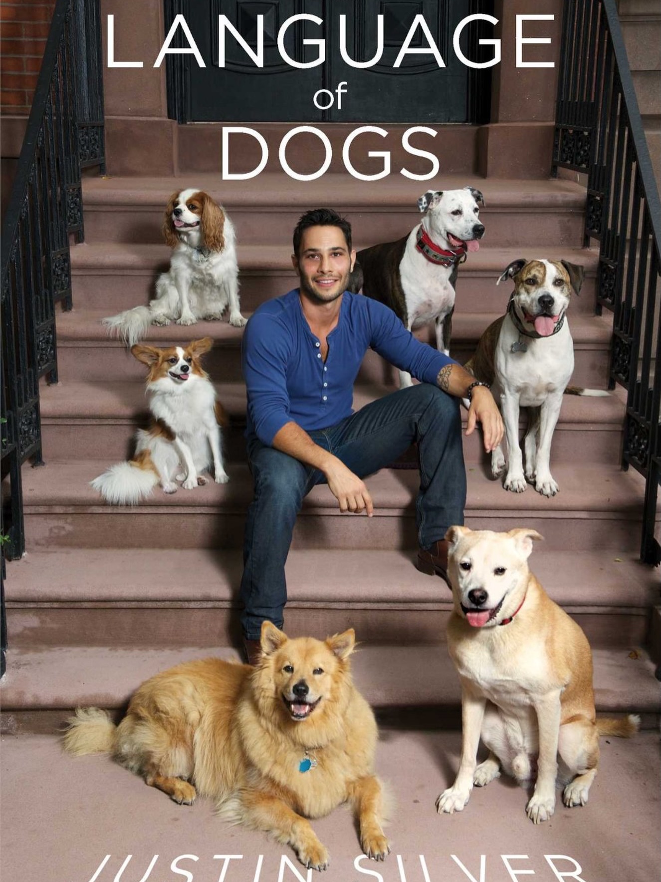 When they shot my book cover they said “We were thinking of you’re chin resting on your folded hand with a few little puppies crawling on your back”. I said- Yeah, guess what we’re not doing. Just shoot me on my stoop with my dogs, aight?!
