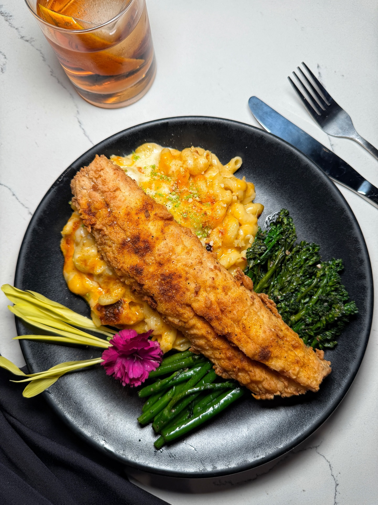 As Good Friday approaches, we’re inviting you to gather with us and kick off Easter weekend over a beautiful plate of fried catfish, creamy macaroni and cheese, and grilled broccolini, a simple and satisfying way to spend the day, so come through tomorrow and let us take care of you.
Reservations available via website for - Good Friday Dinner and all Easter Weekend ✨🩷