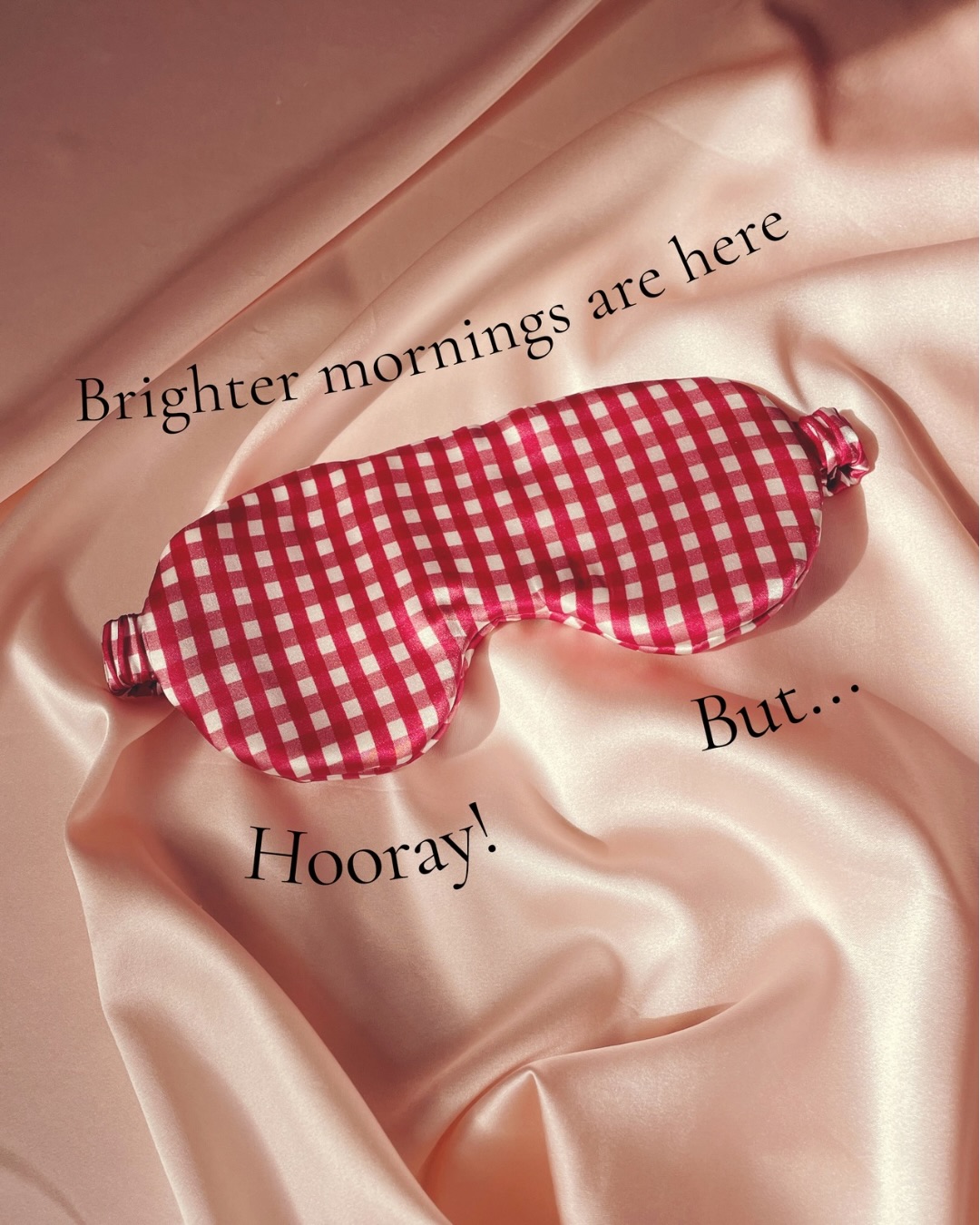 Brighter mornings are here, hooray! But…when you need a lie in, you might need to upgrade your eye mask!
And what better way to upgrade than by using a mulberry silk eye masks with a double layer of plush cotton wadding inside to block the light and a careful handstitched finish
You can even choose from the petite Beth style or the larger Eliza eye mask with more coverage
Image description- 1. A red and white gingham print silk eye mask on a pink silk background
2. Jo, a white woman in her mid thirties, lying on a pink silk pillowcase and wearing a pale pink silk eye mask and pink floral nightie
3. A pale blue silk eye mask being hand stitched shut
4. Two pale blue silk eye masks in two different sizes on a pink silk background
All images have text from the above caption added