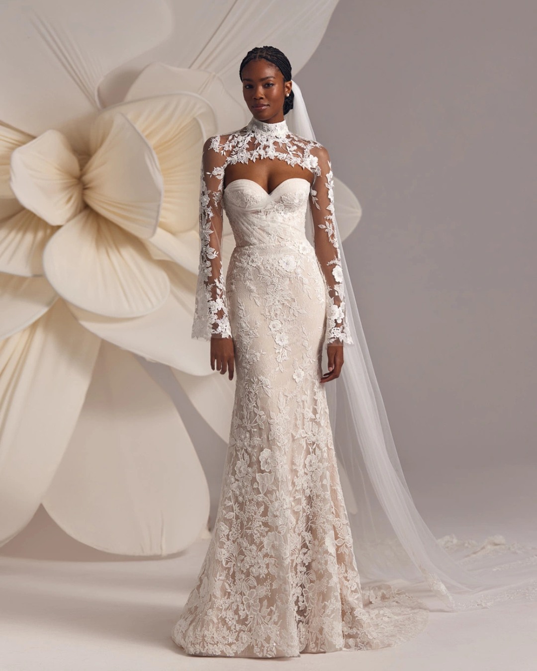 "Darla" brings thoughtful simplicity with striking detail. The heart-shaped corset creates a flattering shape while the delicate floral embroidery adds depth without overwhelming.
What makes this piece special is the lace-up back paired with the removable turtle neck bolero– offering two completely different looks in one gown.
The mesh overlay carries the floral theme throughout, creating movement and dimension as you walk. See how this Less is More IV collection standout feels in person–book your appointment through our link.
#EvaLendel #EvaLendelBride #MiamiBride #BridalStyle #LuxuryBridal #DesignerWeddingDress #SouthFloridaWedding #WeddingDressShopping