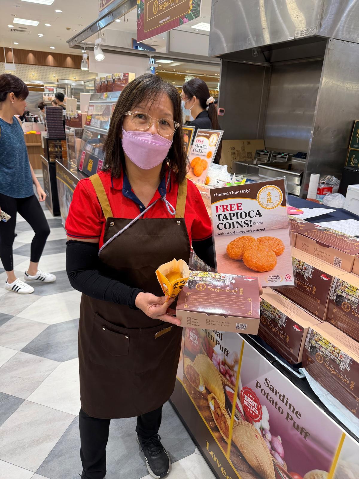 Don’t miss out. The vibes at Takashimaya are sky high and so are the deals!
Swing by our store at Takashimaya Food Hall B2 today and enjoy a special treat: get our tasty tapioca coins free (3 pieces) with every box of curry puffs ordered.
Available from 12pm to 1pm and 5pm to 6pm only. While stocks last!