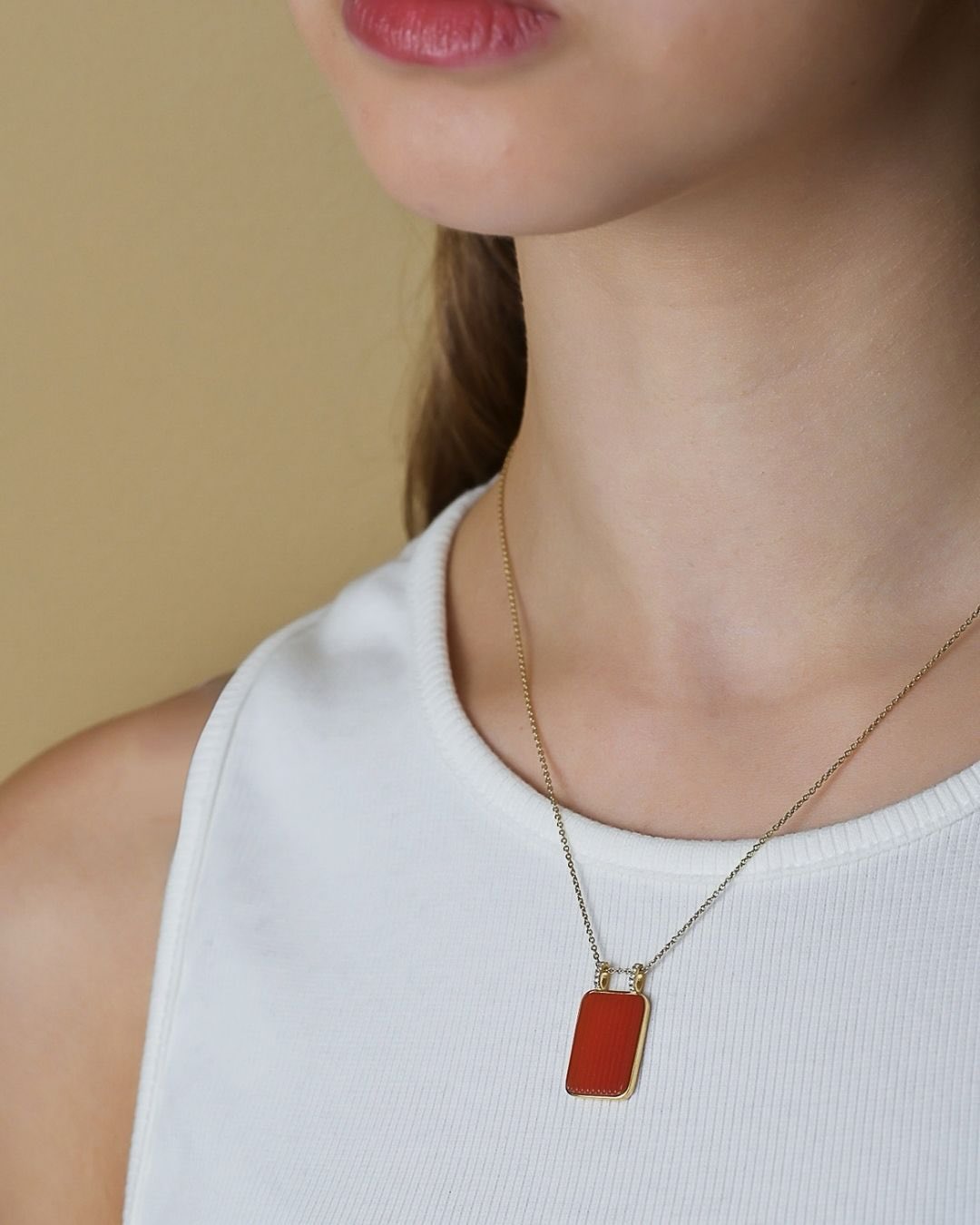 A pop of orange! #fotinipsarouli #fotinipsaroulijewellery #finejewelry #handmadejewelry #pendant