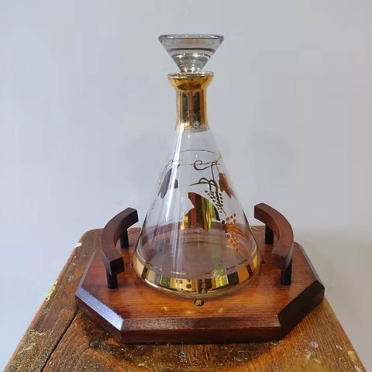 Vintage mid century Bohemian glass wine decanter with lovely oak stand | https://share.google/PhqOg7xwwiYL9WxyT #stufftoyouandme