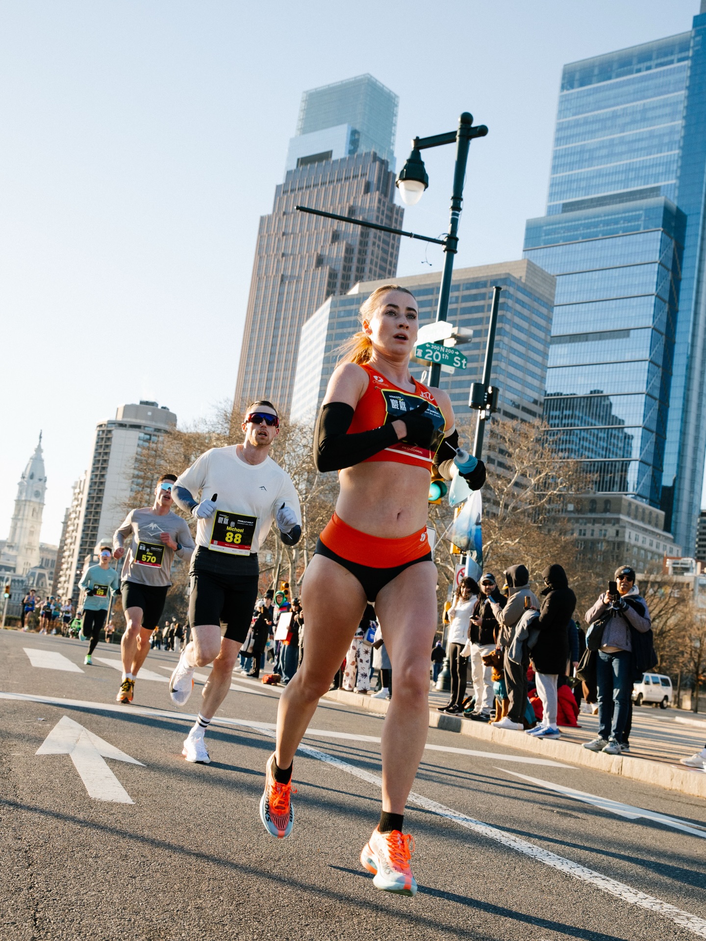 Scenes from Abby’s WIN and new half marathon PB @loverunphilly !! 1:16:05 🔥🔥🧡🏆