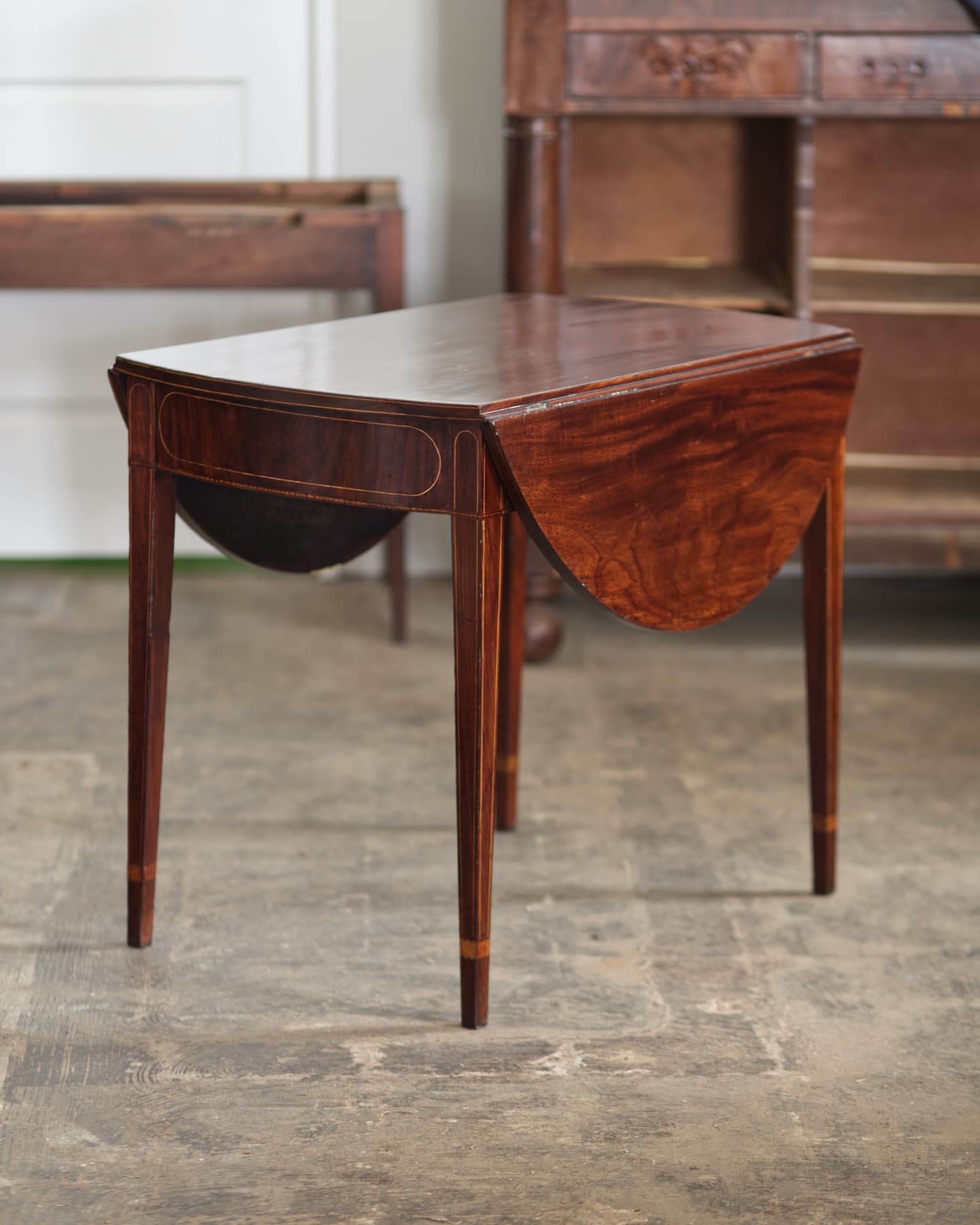 A really nice Baltimore pembroke table in to undo some UV damage. The top and one end were bleached out a bit. After a good cleaning, toned shellac was added to make the color more balanced. The whole thing got a light French polish to bring it all together.
These are great tables. I often see them in the various auctions I look at online. Like a fair amount of furniture from the late 18th century onward, it's not unusual for them to sell for almost criminally low prices. I'm not saying that they may need some repairs or good finish treatment, but (at least in this area), it's a real buyer's market.
#furniturerestoration #furniturerestorer #pembroketable #mahogany #baltimore #maryland #shellac #shellacfinish #frenchpolish #frenchpolisher #restoredinbaltimore