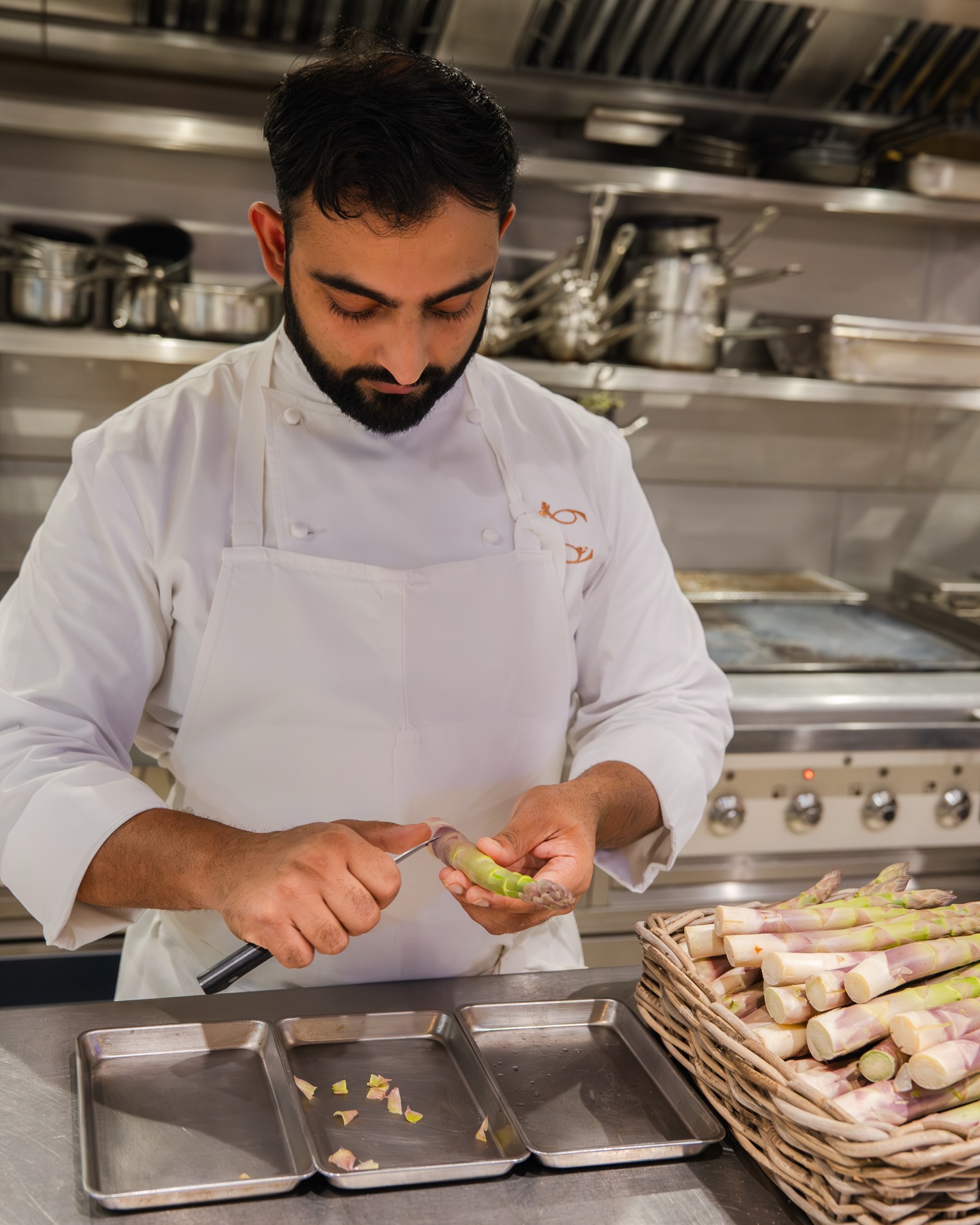 Chef Gary prepping beautiful New Forest asparagus at the very start of the season, ready for our new special with morels, wild garlic and vin jaune.