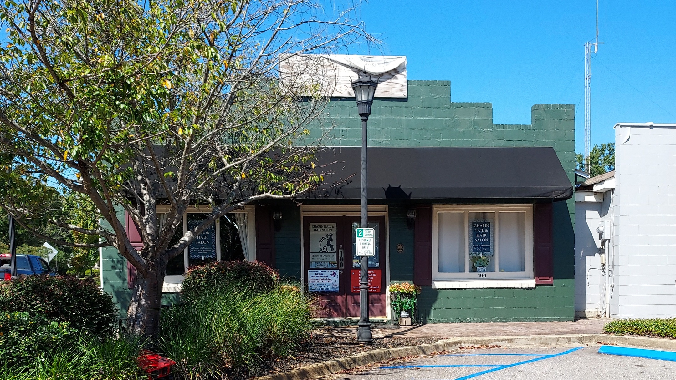 Since 1996, Preservation South Carolina’s Easement Program has safeguarded historic properties across the state, from rural estates to Main Street commercial buildings. Today, the program spans 21 counties, with three new easements added in Pendleton, Winnsboro, and Chapin in 2025.
Spotlight: Bostain Mercantile Building – Chapin
Built in 1943 by Addison Bostain Sr., the Bostain Mercantile Building originally served as a country store and community hub. Over the decades, it has remained in continuous use—today housing a local hair and nail salon—while preserving its historic character. Still owned by the Bostain family and listed on the National Register of Historic Places, it demonstrates the enduring value of preservation easements.
Through voluntary, legally binding easements, property owners help protect South Carolina’s architectural heritage, ensuring that these historic buildings continue to serve their communities and tell their stories for generations to come.