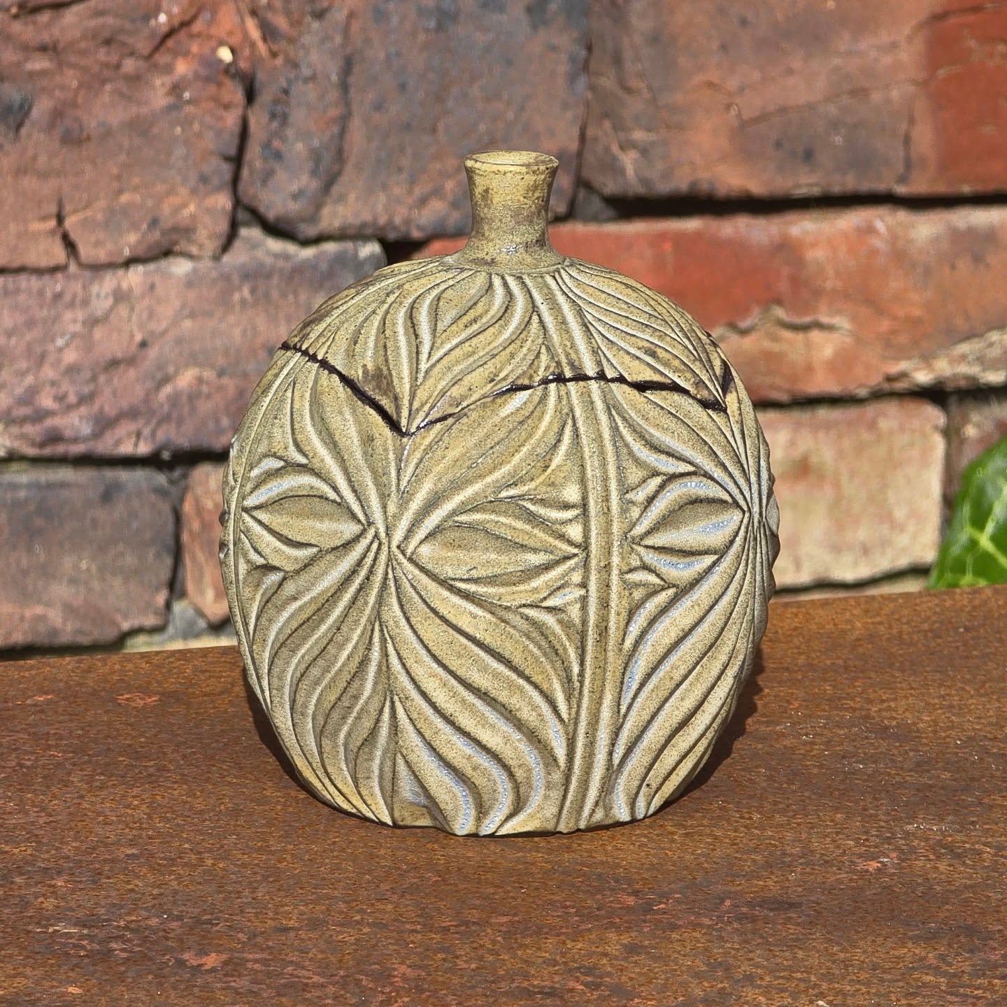 Small pet urn. I'm surprised at how well this glaze plays with black clay.