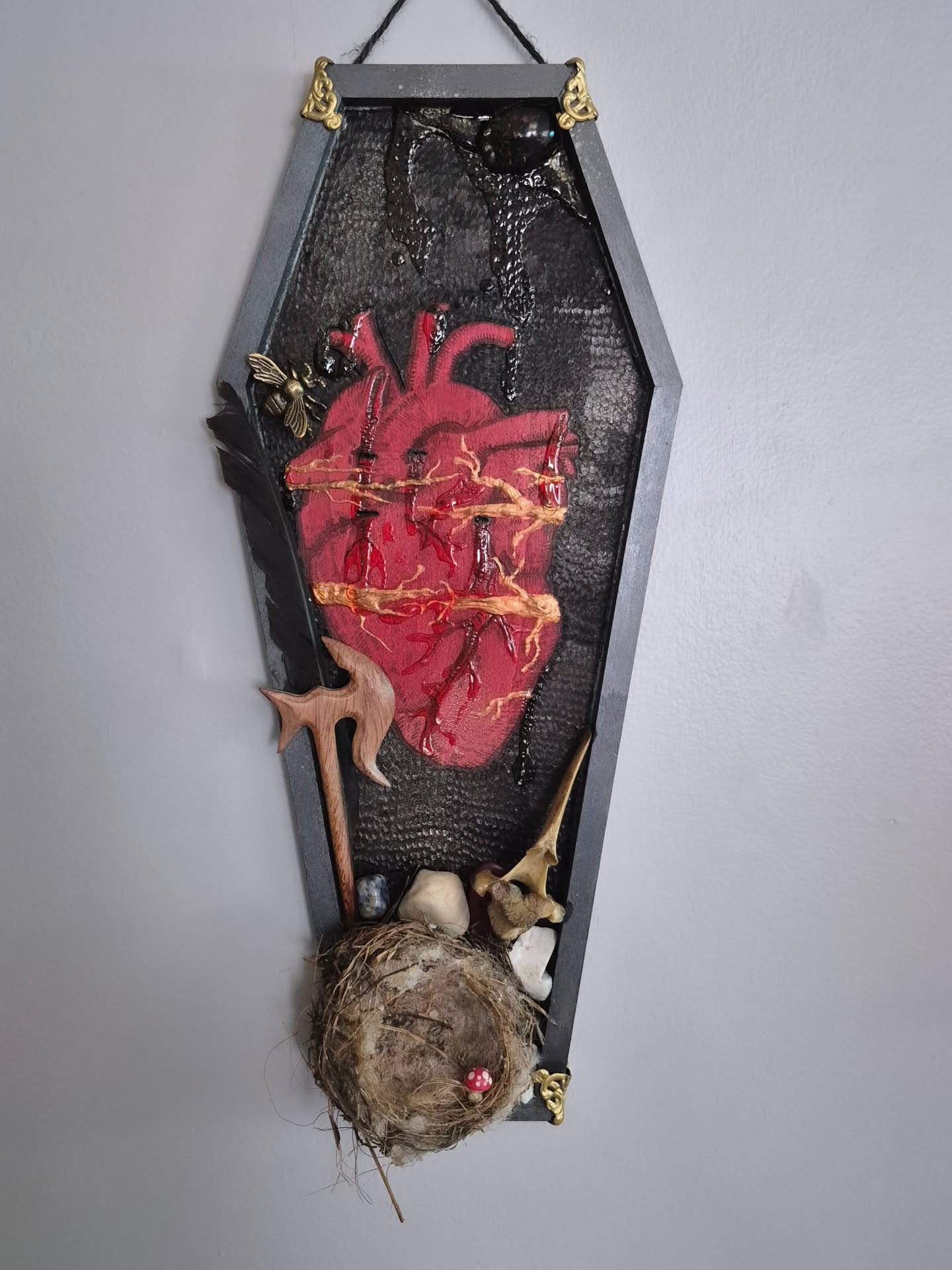 "Ode to a Broken Heart"
This piece features a real bird's nest, a deer spinal bone, an encased wasp, and a vulture feather, among other things.
I always have the most doubt about the pieces I put the most feeling into. I never know how they will be received, if anyone will resonate with them. I have the least level of expectation that a piece like this will actually sell - but as an artist, sometimes I just have to pour my heart and soul into something.