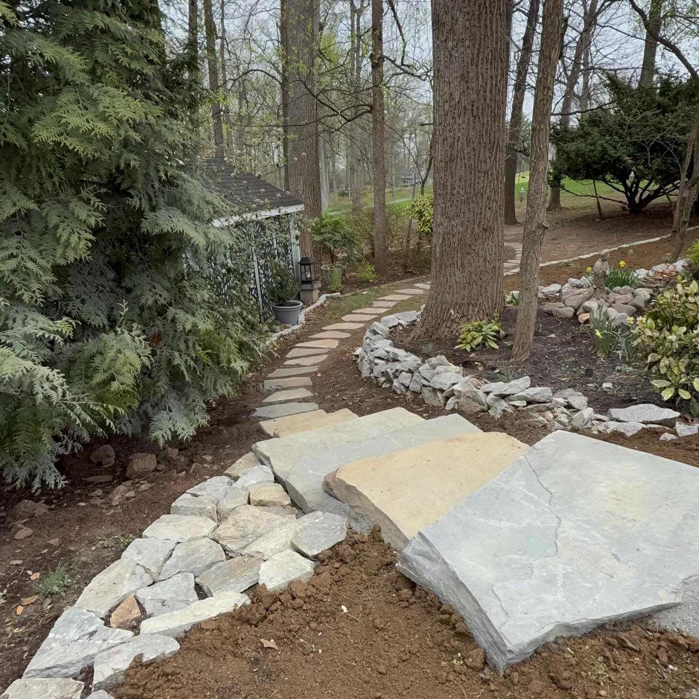 Natural stones through your landscape garden will make all the difference.