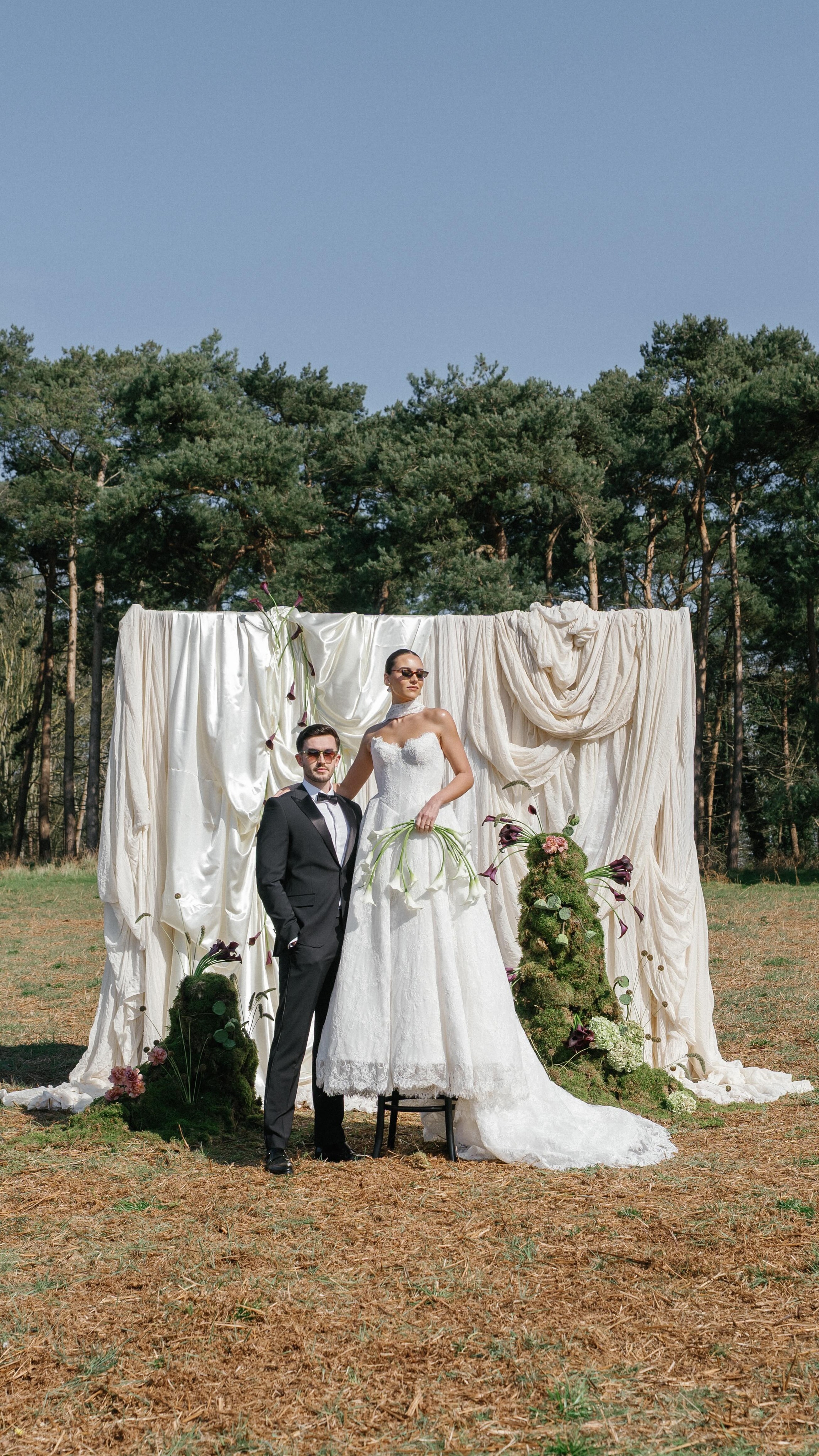 Designed to feel discovered, not designed.
Moss layered and shaped into sculptural forms, rising organically against soft draping at the woodland’s edge🐞🌲
Workshop Host & Cover Photo @sharoncudworthphotography
Workshop @the_edit_workshops
Prep & OTD coordination @weddingswithparris
Floral design @burtonsblooms
Venue @butleypriory
Stylist @synchedevents
Tableware @banquetinghire_official
Lanterns @arrayweddingandeventhire
Stationary @loupaper_
Models @modelcouple_daisyandjosh
Hair @byhollieparsons_
Makeup @emilychantal_mua
Dress boutique @perlanovabridal
Dresses @janehillbridal @champerycouture @mwlbride
Rings @emmagreethamjewellery
BTS content creator @_soireestories
Accessories @perlanovabridal
Suit @cosstores