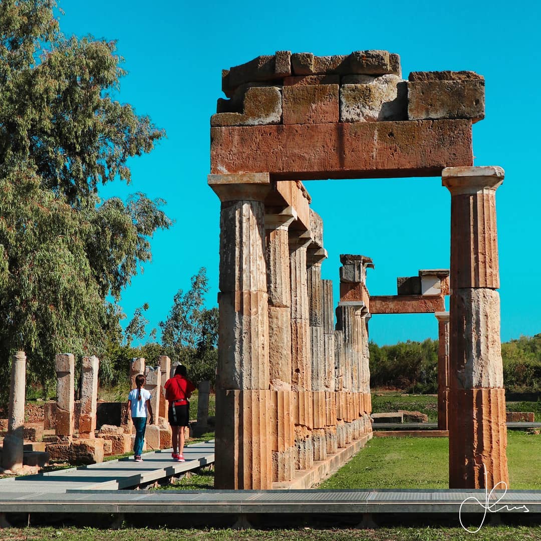 🏺🏛❗ I present to you the Sanctuary of Artemis, the Greek goddess of the hunt, wild animals, the Moon and protector of women in childbirth, at Brauron which is located 45km (40 min drive) from the center of Athens! It functioned as a place of worship for at least 500 years (8th c. BC – 3rd c. BC) and is considered one of the earliest & most important sanctuaries of Attica that had great significance for Athenian women. Young girls who were approaching the age of marriage spent a vital amount of time here running races, partaking in sacred dances and in fully devoting themselves to the goddess through sacrifices. There was a noteworthy festival held here every 4 years called the “Brauronia” and part of it was the ritual of the “Arkteia” that involved these young women acting as she-bears (“arktoi”) and marked the completion of their time here (rite of passage). Witnessing the serenity of the site I have the feeling that these young girls must have been sad to leave from this enchanted sanctuary! In the water spring of Brauron, nearby many artifacts (token objects) have been discovered that were offered to Artemis on the eve of marriage and during childbirth.
◾◾◾
The Doric prostyle Temple of Artemis was constructed in the late 5th c. BC of local Tufa (limestone variety) stone as a replacement to an older Archaic temple on the site and again feels unusual especially in terms of color at least to a Greek who is used to marble. It should be noted that there was a fabled sculpture of Artemis of immense beauty in the temple allegedly made by the renowned sculpture Praxiteles (395 BC-330 BC) as mentioned in texts by Euripides, Pausanias & Plutarch! It should also be mentioned that the site was known & inhabited as early on as the Neolithic period.
◾◾◾
I wanted to make a change in my life and one day spontaneously I decided to get in my car and drive to a place where I could clear my mind and feel the tranquility of the ancient world. When we were in Elementary school we had a field trip here I must have been around 7 years old and unfortunately I never visited again until this day when the goddess Artemis inspired me to make Greek Temples during this visit!
◾◾◾