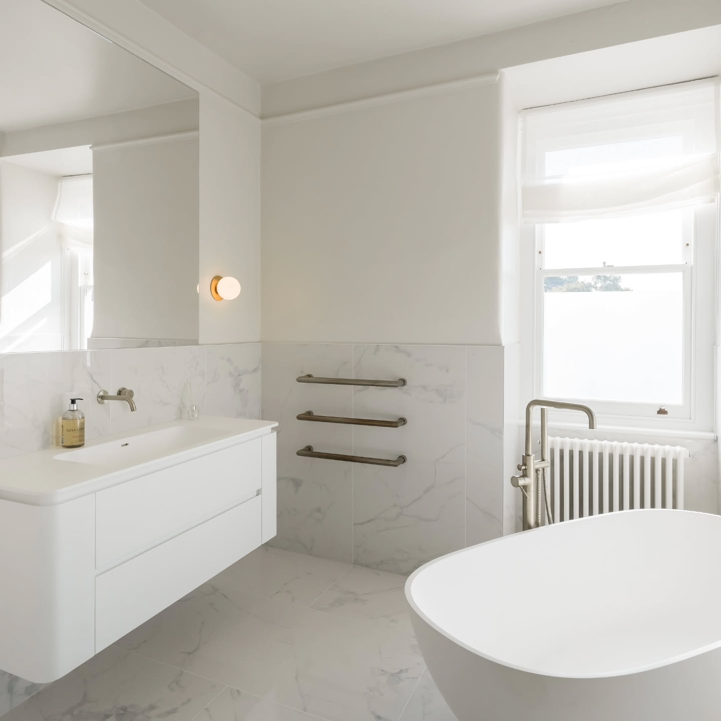 Integrating wall-mounted fixtures into marble requires zero margin for error, the plumbing must be perfect before the first slab is even cut. We traded visible pipes and clutter for absolute seamlessness.
From the architectural curve of the freestanding tub to the exact alignment of the brushed brass mixers, every detail in this recently completed.
@hira_construction
#HiraConstruction
#bathroom
#freestandingbathtub
#brassfinish
#richmondhomes