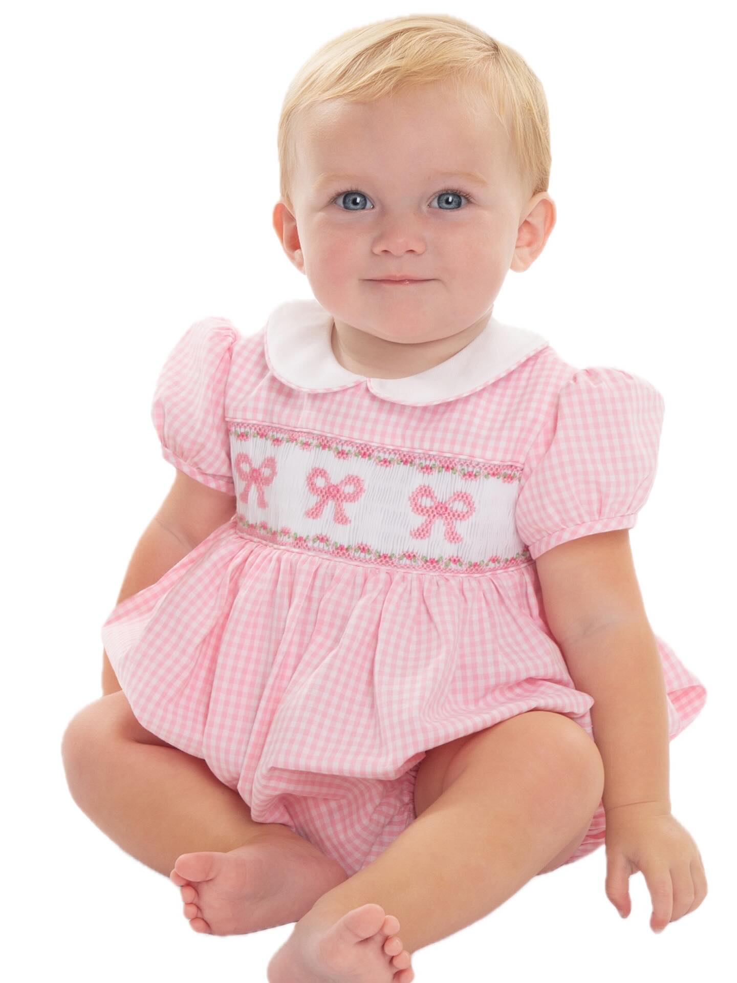 A perfect pink bow 🎀
Let us help you create this adorable smocked bubble for girls. We will include a pleated insert for you to smock and finish construction on this adorable outfit. Kits include fabric and necessary notions as listed below.
This kit includes:
Gingham 1/8” Fabric
Lining
White Pleated Insert and Expertly Chosen Floss
White Pique for Collar
Cording for Piping
Elastic
Buttons & Snaps
The Children’s Corner Reese and the Bows smocking pattern (included within your Reese pattern) are sold separately.
#ccpreese #sewingkit #sewingforgirls