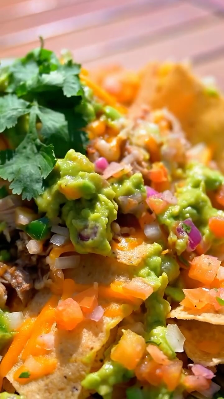 Kick off Super Bowl Sunday with our Super Bowl Day Pupu: Kalua Pork Nachos.
Crispy tortilla chips piled high with cheddar jack cheese, smoky kalua pork, guacamole, and pico de gallo—big flavor, game-day perfect.
Join us Super Bowl Sunday and snack like a champion.