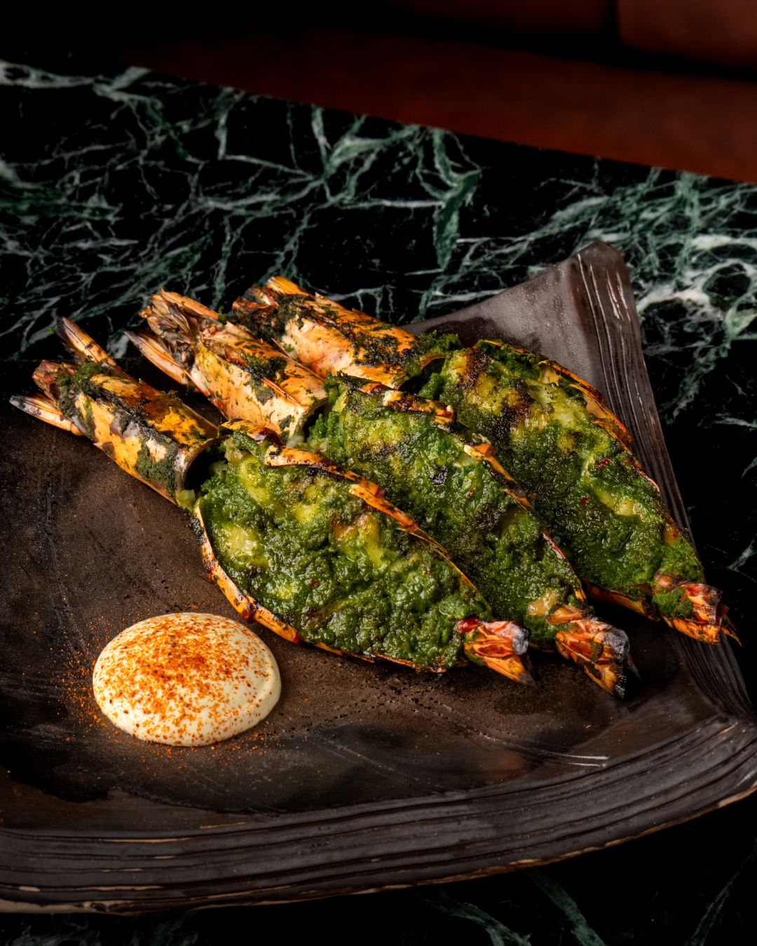 Fire, spice, and the ocean’s finest. 🔥🦐 Our Jhinga Jaisamandi features succulent tiger prawns marinated in a fragrant herb paste, then roasted over charcoal for that irresistible smoky finish.
A dish that’s bold, aromatic, and made to impress.
Reserve your table and experience it fresh off the fire.
ไฟ กลิ่นหอม และความสดจากทะเล 🔥🦐 Jhinga Jaisamandi กุ้งลายเสือหมักเครื่องเทศสมุนไพรหอมๆ ย่างบนเตาถ่านจนได้กลิ่นรมควันที่เป็นเอกลักษณ์
จานนี้ทั้งเข้มข้นและน่าประทับใจ จองโต๊ะแล้วมาลองแบบสดใหม่จากเตา
👉🏼 For reservations: Link in Bio.
📞082-997-3399
📍Erawan Bangkok, Fl.2
🕒 Open Daily, 11:30 - 22:30
#JharokhabyIndus #JharokhaBkk #JharokhaBangkok #CelebratewithJharokha #IndianCuisine