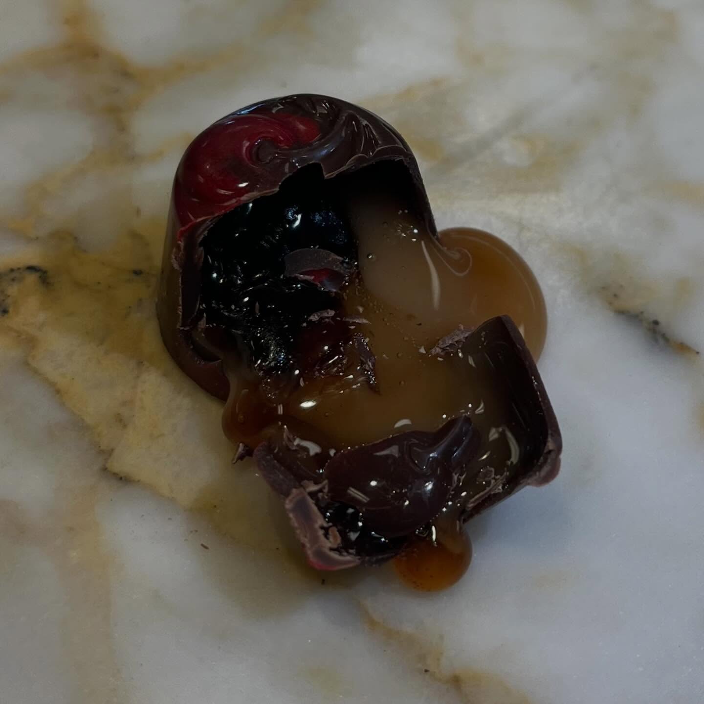 🌟 Truffle Feature 🌟 The Cherry Cordial 🍒
Our booziest truffle and one of our top sellers, the Cherry Cordial will both melt in your mouth and fill it with a full cocktail! With its brandies cherry in the center and liquid fondant wrapped in rich dark chocolate, it is bound to please your tastebuds!
#cherrycordial #stargazerfinechocolatesandcoffeebar #denverchocolate #artisanalchocolate #denvershop