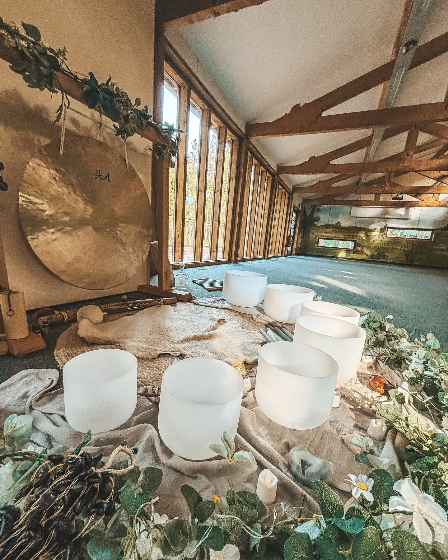 Sound baths within Worcestershire 🌱
Sharing relaxation sound bath sessions within the Wyre Forest has been so special over these past few years. Connecting to the natural world already helps us to relax the nervous system without the need to try, it calms the mind and heart, it soothes our senses and it helps stop time.
I share monthly sound baths within the beautiful forest hut. With floor to ceiling windows we are able to witness the changing seasons of the woodland, allow the natural world to interweave with the sounds of crystal singing bowls, chimes, gong and many other instruments.
Sound bath sessions are created with deep rest and relaxation in mind, just lie down and be bathed in the vibrations and energy of healing.
Honouring a closed container for participants, let yourself be held without words, conversations, external pressures or the need to keep up. Let yourself surrender into the loving arms of the Wildlove community.
If you would like to join me for a workshop sometime, you would be warmly welcomed. You can find all details on my website www.wildloveyoga.com with self care and themed practices in mind.
All my love,
V x
#yoga #yogapractice #yogainspiration #yogaclasses #crystalsingingbowl