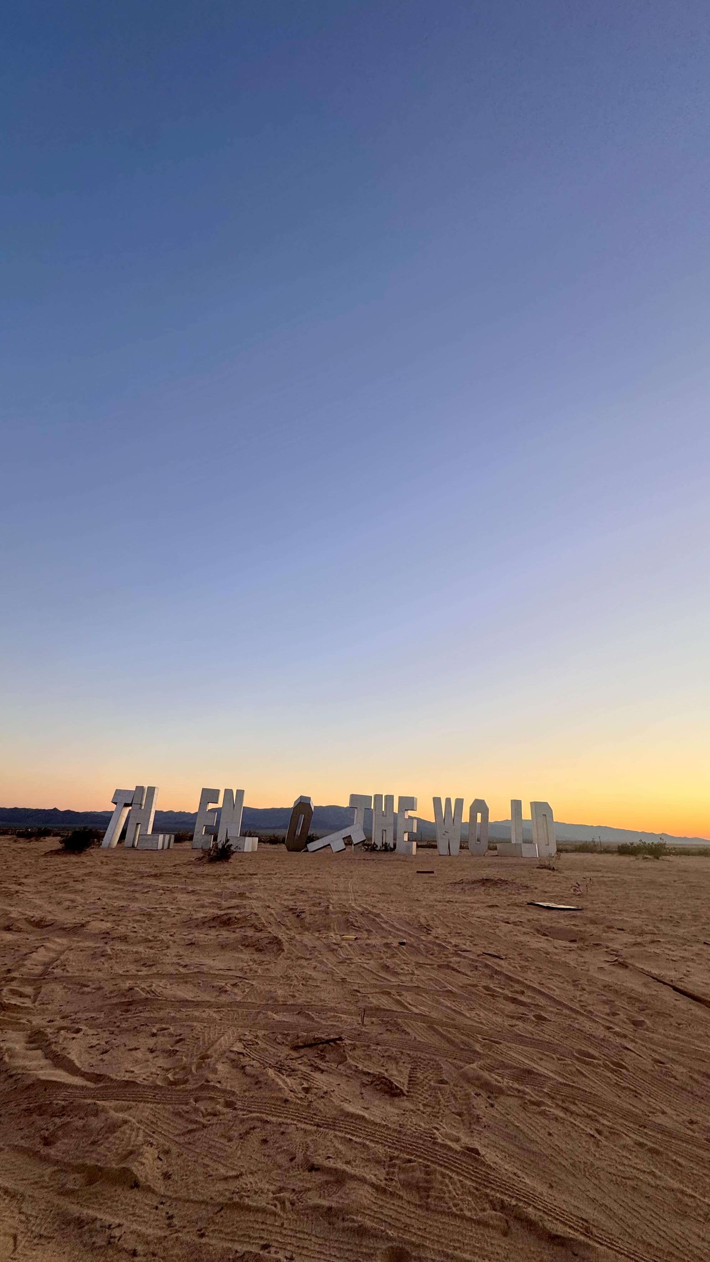 Twenty-nine miles northeast of Joshua Tree, you’ll find a silver silhouette against the sky that reads: The End of the World. These 16-foot wooden letters, crafted by artist Jack Pierson, serve as a quiet desert homage to the Hollywood sign @jackpierson9 .
Find it: Tucked just behind The Palms Restaurant @palms_wonder_valley_ & a must see on your next desert getaway. You’ll want to save this one for later.
#travelcalifornia #wondervalleycalifornia #hiddenplaces #slowtravel #travelitinerary