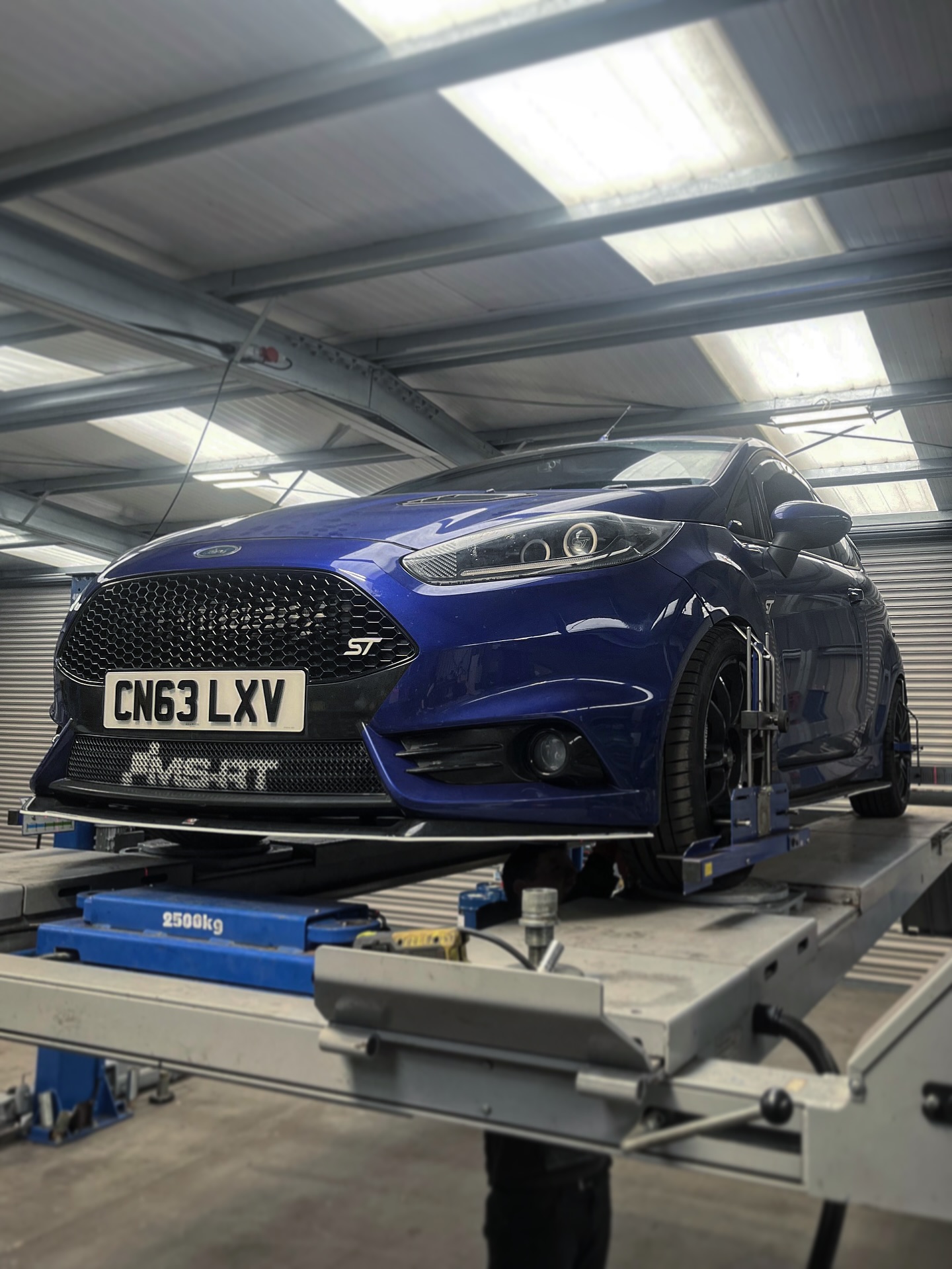 🚗💥 A Fiesta ST180…. From misfire nightmare to full transformation.
This one came to us from Norwich with a horrendous misfire. When we carried out a full vehicle health check, the first thing we noticed was a strong smell of fuel under the bonnet.
⚠️ Upon removing the ignition coils, we realised how lucky the customer was, there was a large amount of fuel in the cylinder head chambers. With spark-induced misfires in play, this could have ended very badly.
The car had upgraded injectors and mapping from a previous tuner, but the fuel leak was clearly coming from the injector fuel rail seals. When we removed the rail and injectors, we found split O-rings, more likely down to poor installation.
🔧 While we were in there:
Replaced leaking rocker cover gasket.
New fuel-side injector seals, clips, spacers + Teflon double seals on the combustion side.
Spark plugs were cracked and in poor condition – swapped for NGK Iridium 1-step colder, gapped for big boost.
Compression test? All excellent ✅
Still misfiring after a road test – replacement coils cured it completely.
But that wasn’t all…
We also found:
Leaking front crank oil seal… A questionable super glue repair on the intake manifold (replaced with a good used part)
Since the crank seal needed timing belt removal, we did the full timing belt + water pump.
New Vibratechnics engine mount.
Replacement recall-type header tank.
Finished the engine side with an oil & filter change, pollen filter, and a gearbox oil change with Millers oil for extra peace of mind.
🛠️ Then onto the rest of the car:
Worn lower ball joints → new lower suspension arms with Whiteline & Powerflex bushes.
Powerflex rear axle bushes.
New 280mm rear discs, pads & calipers + brake fluid flush.
Full wheel alignment.
After road testing and data logging, fuel trims were all over the place. The injector scaling hadn’t been adjusted for the larger injectors. Simple fix, we moved the car over to our software from @motorsportdevelopments and completely transformed the drivability.
👏 Thank you for trusting us to get your car sorted. This was a big one, but we got there.
#fordspecialist #st180 #fordfiestamk7 #mk7st180