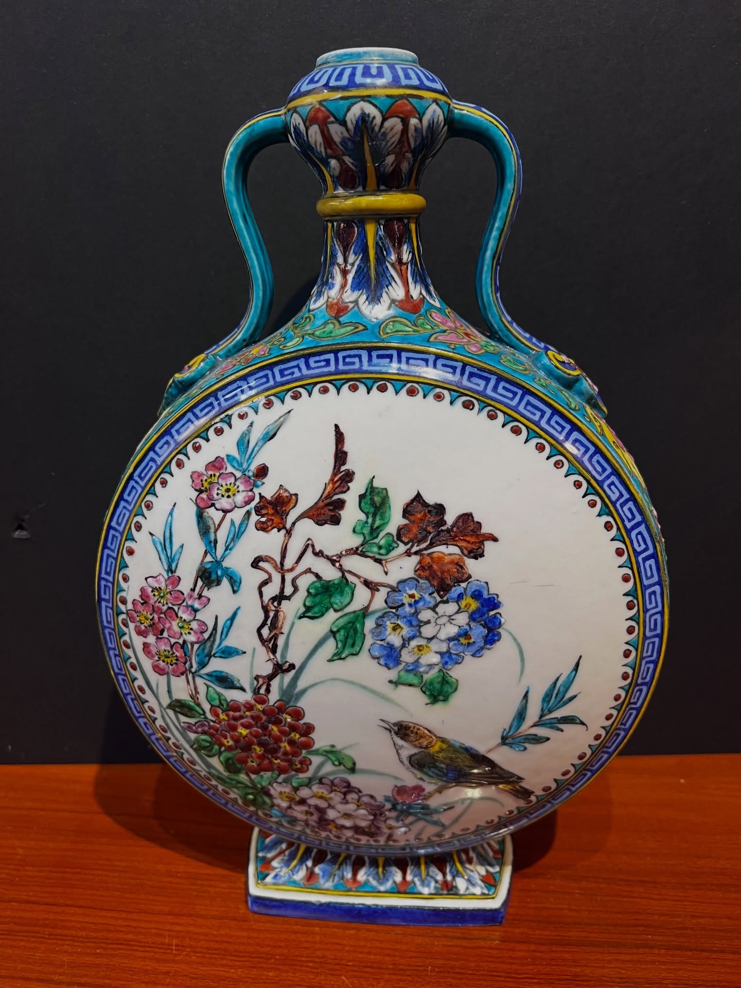 A beautiful and unusual 19th century French faience vase from the workshop of Théodore Deck, celebrated for his rich turquoise “bleu Deck” glaze and his fascination with Persian and Japanese design.
This elegant double-handled form features finely raised enamel decoration with vibrant florals and birds, framed by geometric borders in deep cobalt and turquoise. The colour alone is unmistakable — luminous, saturated, and full of life — a signature of Deck’s work in the late 1800s.
A striking decorative object that bridges East and West, equally at home in a traditional interior or a more contemporary setting.
France, circa 1870–1880
Excellent antique condition with minor age-related wear
Available in the shop
#theodoredeck #frenchceramics #antiquedecor #japonisme #persianinfluence 19thcentury interiordesign vintagehome collectedinteriors westvancouver martineboreantiques