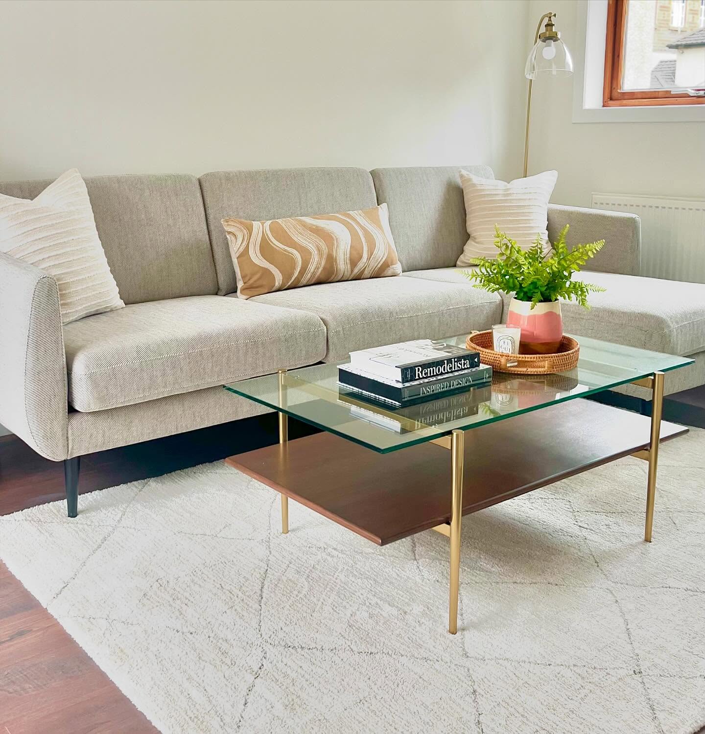 I’ve been completely rubbish on social media recently, thank you to anyone who is still following me and enduring my very haphazard approach to posting!!
I’ve got a little snippet of a current project to share with you. Here are some before and after pics of a living room I have designed for a client. She wanted a calm, contemporary and neutral look, with elements of brass and dark toned wood.
To keep cost down, I sourced the chaise sofa, tv unit and rug from Ikea, then splurged on the coffee table and cushions to elevate the overall look.
Under the wall mounted tv unit, we’ve added an LED strip light in warm white which will create a lovely relaxed atmosphere in the evening.
I’ve also re-designed my Client’s bedroom in the same style and neutral colour palette, pics coming soon!