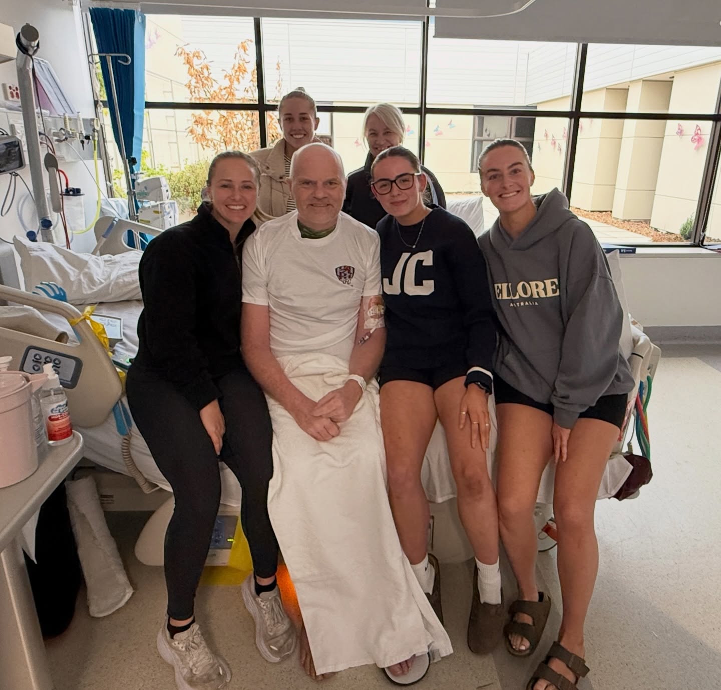 Things you love to see 🥺
Last week, some of our Senior women, along with Jayne, made the trip to visit Darryl (Griffo), who is still recovering from his accident.
The girls couldn’t wait to wrap him in their arms and show their love and support.
Griffo, your incredible strength and courage throughout this difficult time has inspired us all and the Hillwood Football Club is with you every step of the way.
While we sadly won’t have you back to coach our girls this year, we want to thank you from the bottom of our hearts for the time, effort, and dedication you’ve given to the women’s team. We know coaching is something you hold close and for now, the girls will play every game with pride, inspired by you.
It was so good to see you griffo and we wish you all the best in recovery, absolutely smashing it already 💙💙