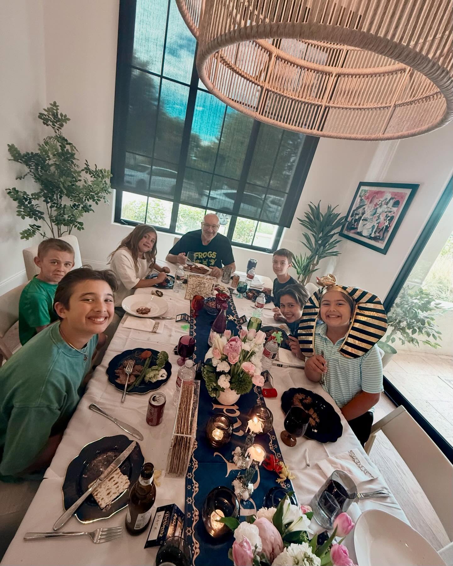 Pharaoh even found the matzah!! 🫓
Alex’s annual Seder headpiece 🤣
May our kids continue this beautiful Passover tradition together, always ❤️