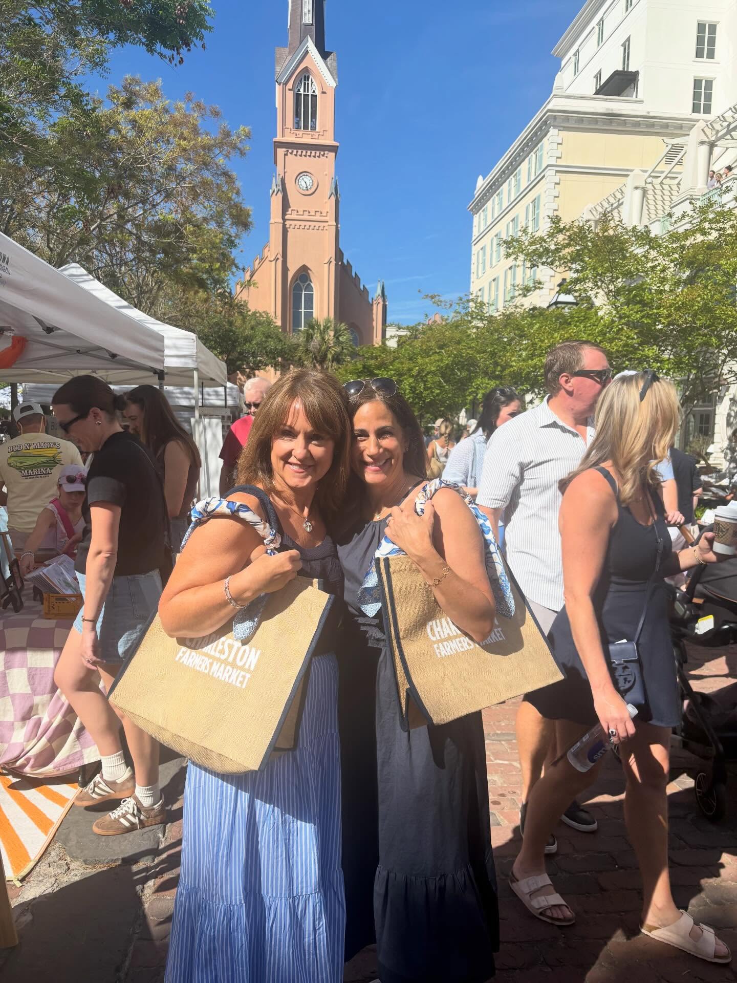 The cutest ladies with the cutest totes 💙 We are loving being back @charlestonfarmersmarket and will be in Marion Square every Saturday from 8-2pm ✨