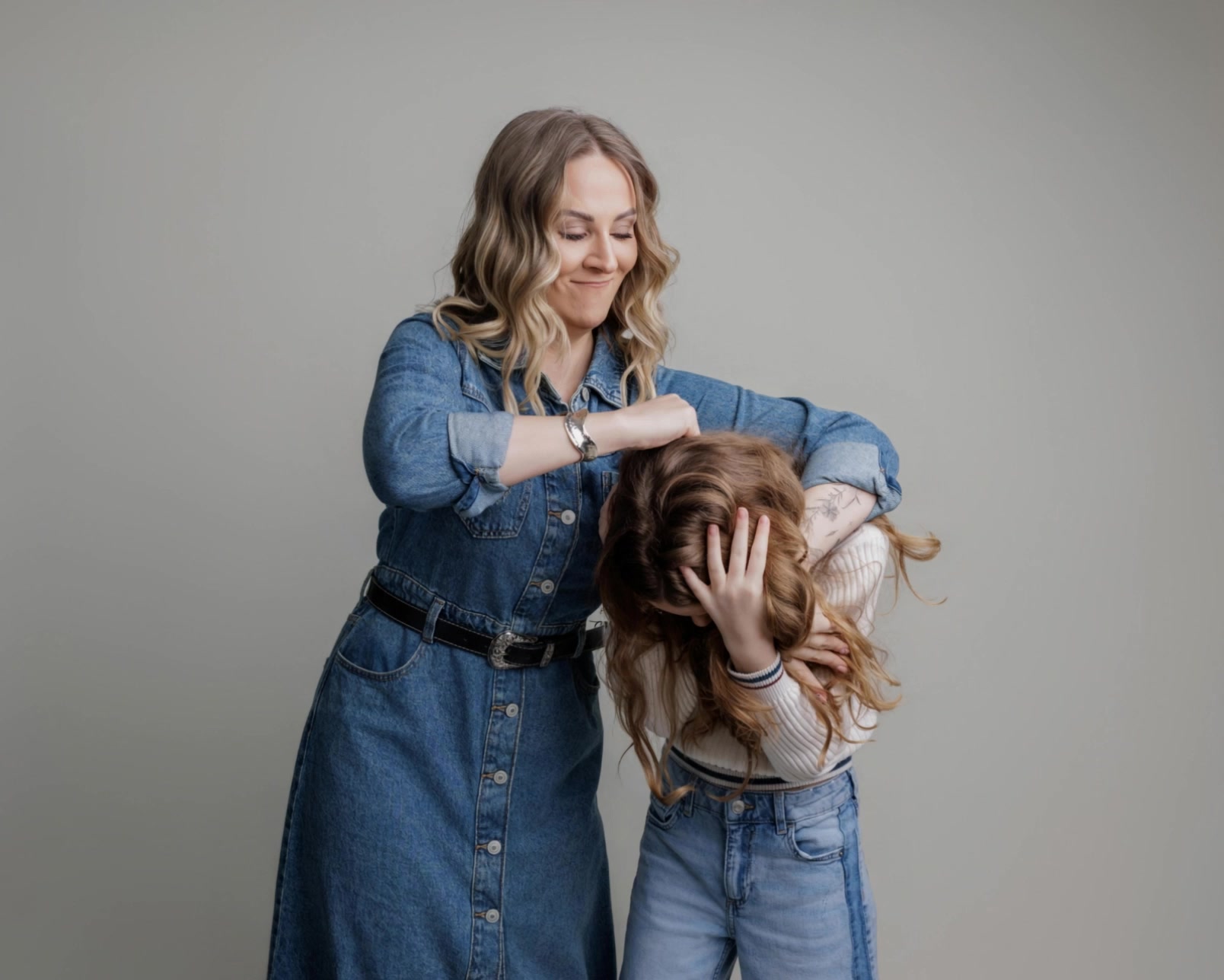 This is your reminder that family photos do not need to be stiff, perfect or everyone looking nicely at the camera.
Sometimes the best bits are the play fights, the laughing, the chaos and the little moments that feel the most like you.
That is what makes family photos worth having.
Not just how everyone looked, but how it all felt.