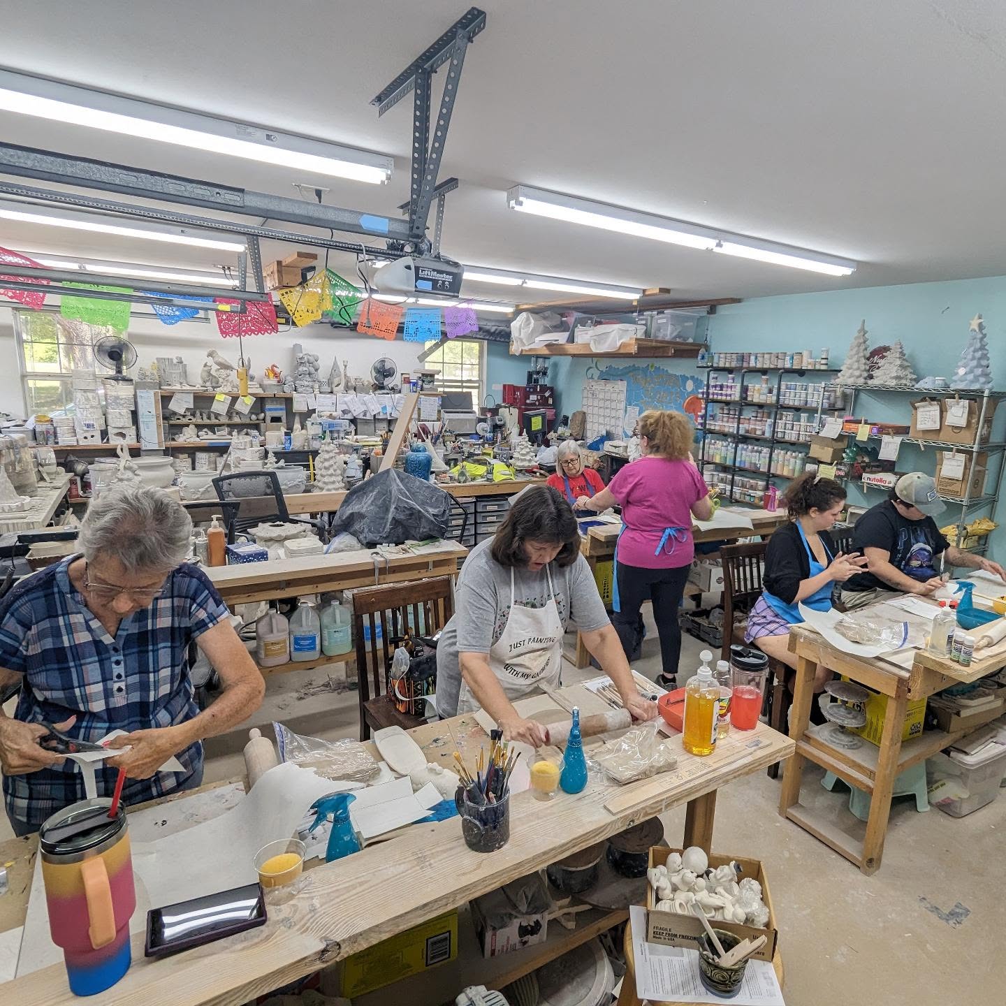 Haven't posted a lot lately sorry. But we have a full class today! We are hand building butter dishes.