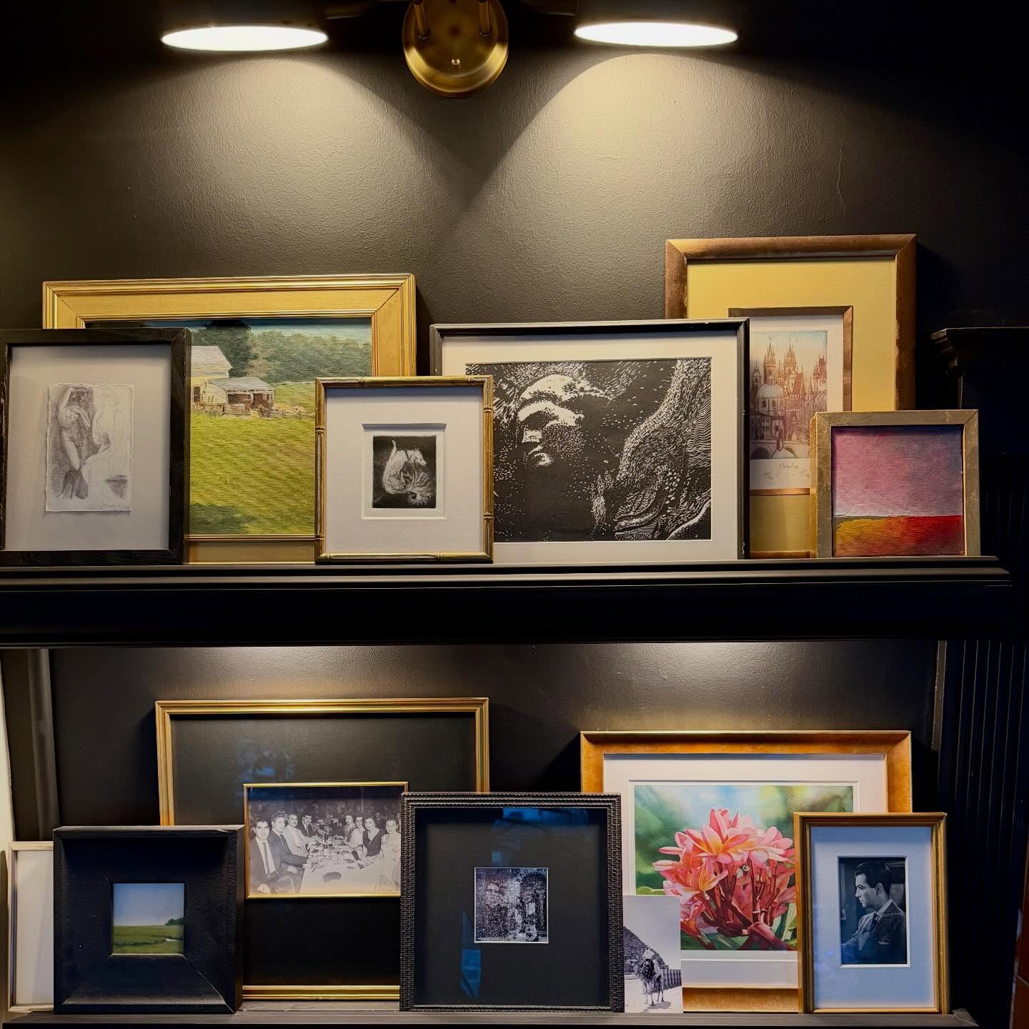 Another little corner of my world. This was a short side wall that I felt perfect to stuff with framed pictures and art. I had a crazy vision of cascading light to showcase everything I displayed. I started with picture ledges and under cabinet lights from ikea. It morphed, as these projects do. I added baseboard moulding, in different stacking combinations, to the front of the shelves to diffuse the light. And painted the whole thing black. I loved how it came out! The slideshow at the end shows a bit of the process. Enjoy! #gallerywall #blackwall #framedart #ikeahack #customartframing
