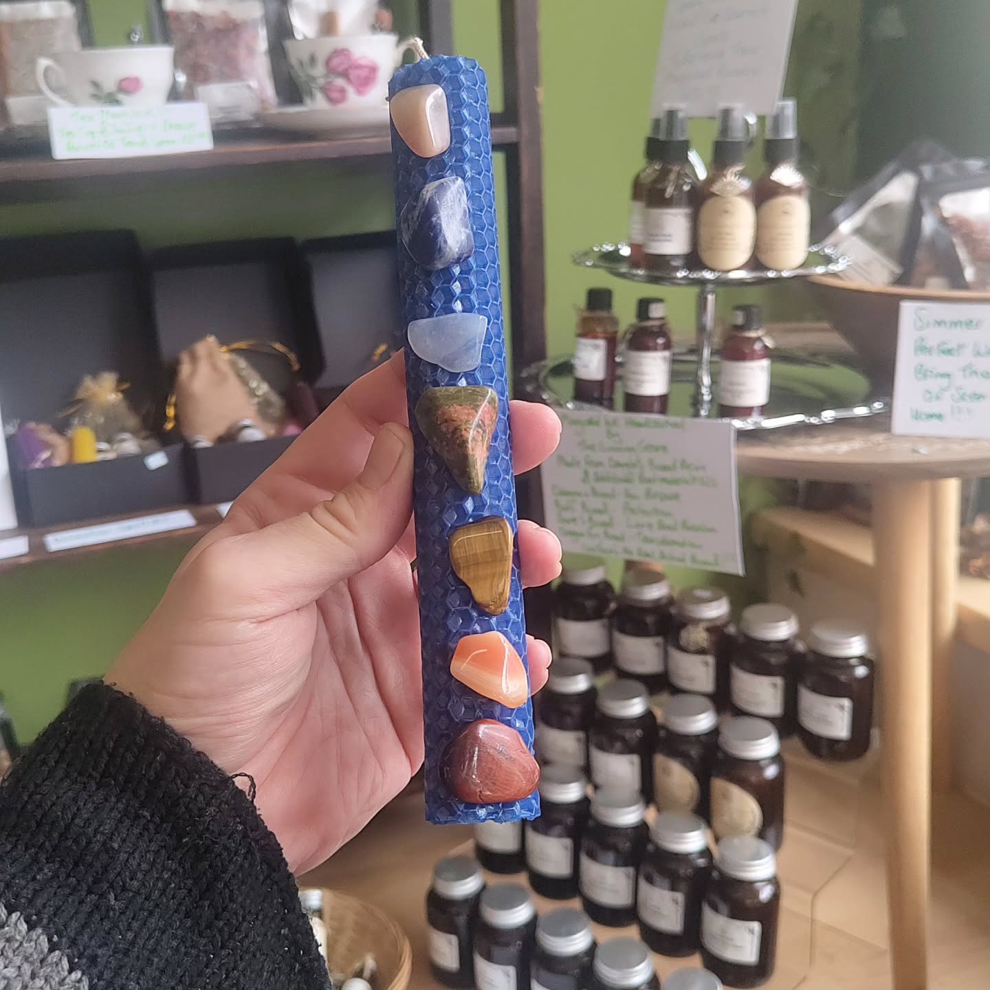 Good evening Wytches, it's been a crazy busy day, I've been at work crafting new candles.
1st up we have this Beautiful Chakra Healing Candle. Each Crystals has been Blessed and Charged to work with their Aligned Chakra. Bringing Healing and Balance.
Light and sit with each Chakra, each section will burn for approx 30 minutes. Making it Ideal for a 7 session Chakra Healing course.
At the end you have aligned and balanced Chakras, plus 7 Ritually Charged Crystals to use in further Healing Sessions. Cleanse and Charge in the Moon Light.
£12.99 available in the shop.
We also have a new 4 inch long, but thinner Beeswax Spell candle, they fit our Pentagram Candle Holders.
We are currently reworking our Witchcraft Essentials kit, which will feature these thinner spell candles. This will enable us to add the Candle Holders, to round out the kit alongside Herbs, Resins, Oils, ink and crystals.
With the thinner Candles, changing the packaging for the herbs to a more cost friendly option, that enables us to increase the amount of herbs per packet. And still be in a position to reduce the cost! Which is really amazing.
We are currently looking at the viability of crafting a "mini" Altar set to be offered an option of a mini Chalice, Bell, small cauldron and a letter opener size Athame or small wand - some potential for creativity.
Seeing all the new candles out really elevates the whole display whilst giving our customers more diversity and choices with their Magickal workings.
The new thinner candles will be 75p, available in store now.
I'm a little behind in uploading our products to the Website, I'm currently working on adding Rebellious Rocks and Dr Ali G Reliquary of Ancient Wisdoms products to the Website.
That being said I'm also updating our Coven Grimore as we move into our 3 months of Magickal Herbalism!
We have spaces for our online coven, which are having their first meet up online next week!! We are making, Magickal Botanical ink!
See you all soon
Blessings of the Land Sea and the Sky ❤️❤️❤️❤️