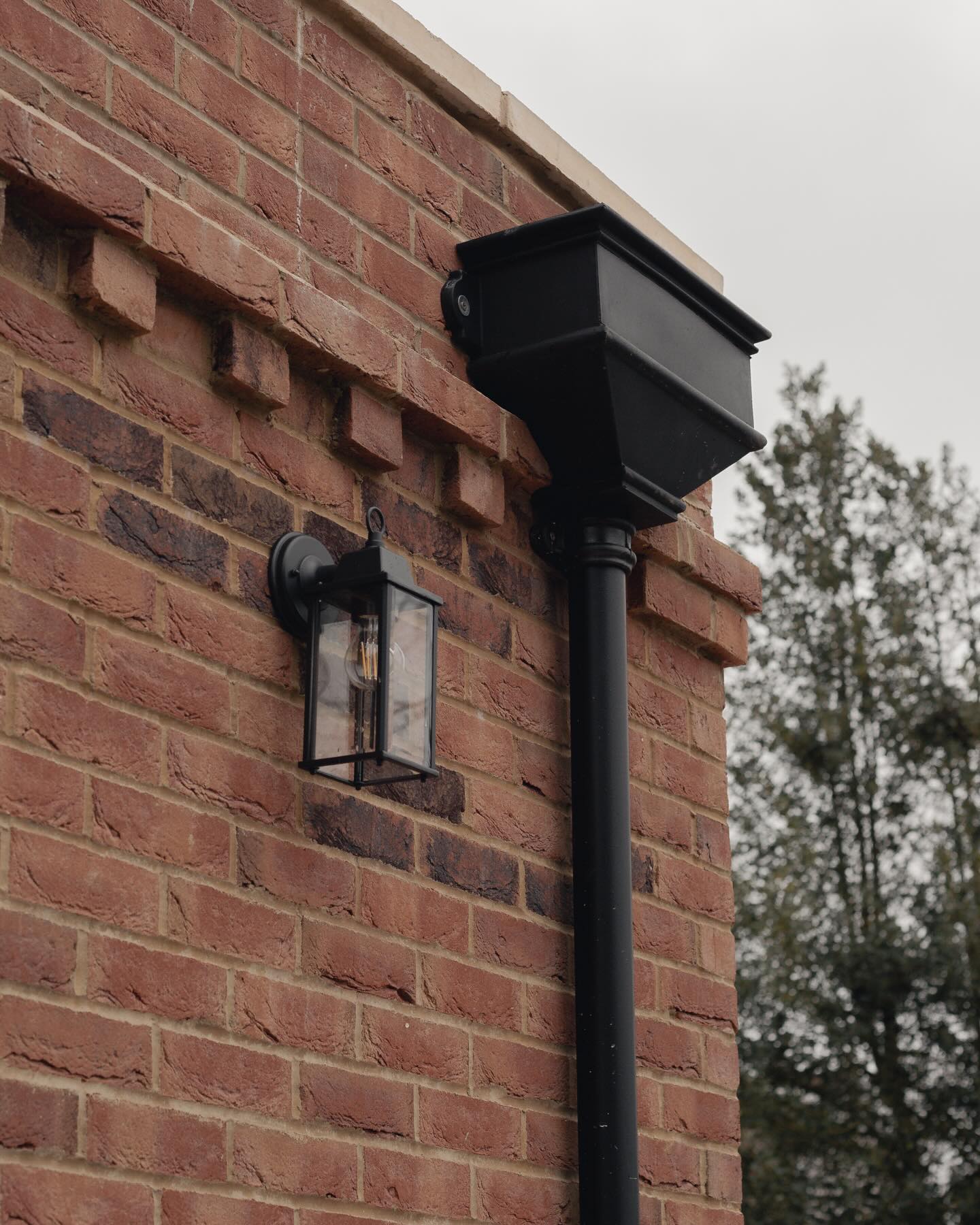 Royal Tunbridge Wells
The parapet roof drains into an oversized cast iron effect hopper and downpipe, designed to give the elevation a little more character than a standard rainwater pipe.
To keep the finish clean, the brickwork was set out so the hopper and downpipe could sit flush within the wall rather than projecting out from it.
A small detail, but one that makes a big difference to the overall look of the side elevation.
SOHO Developments | High-end builds & Refurbishments