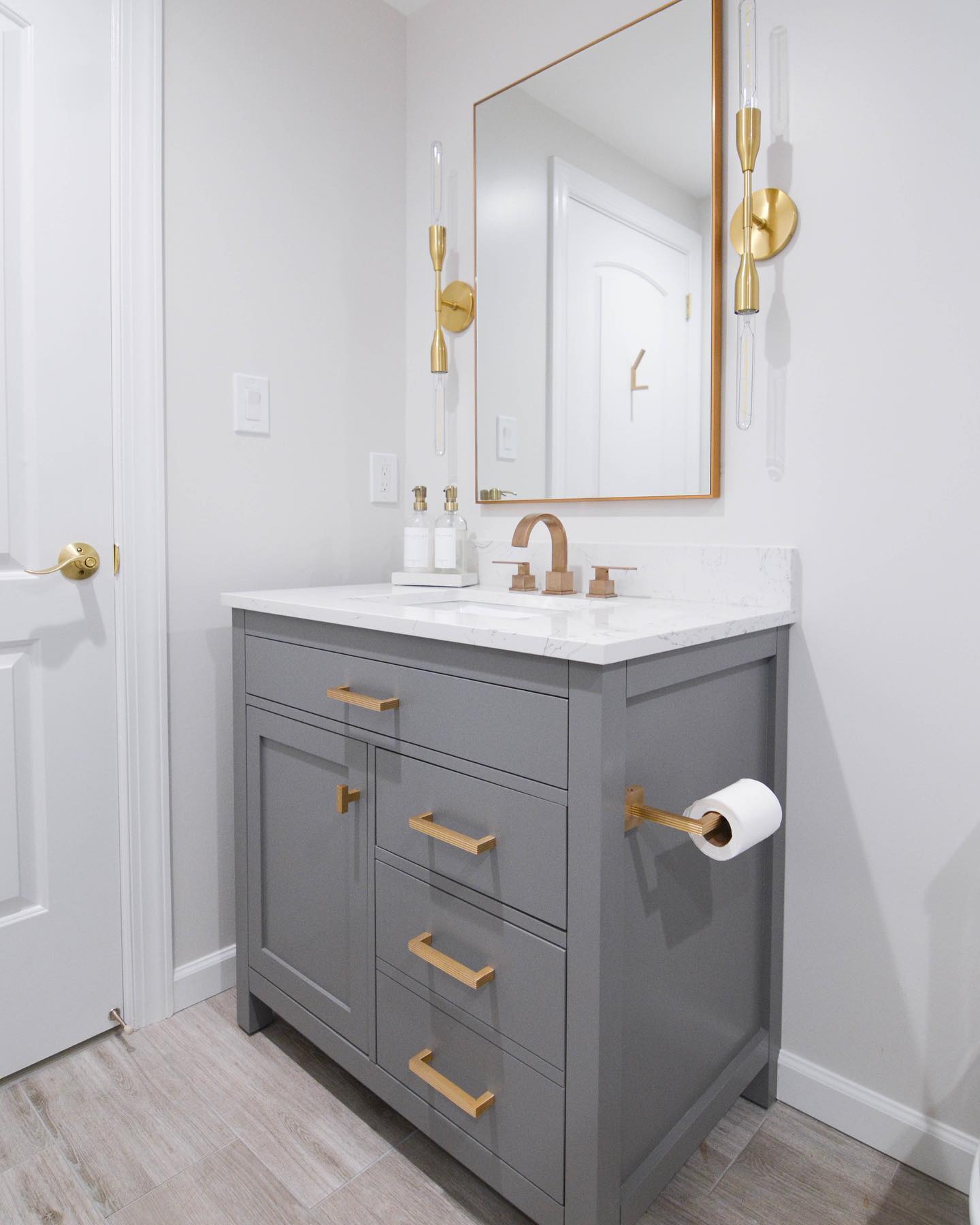 This spa-like basement bathroom came a long way!
Swipe to see the before photos.
*Tip: You can often times switch out the hardware to a pre-fabricated vanity which is what we did here.
This vanity originally came with a brushed nickel knob and pulls.
#basementbathroom #bathroomreno #bathroomtips #goldhardware #renovationtips
