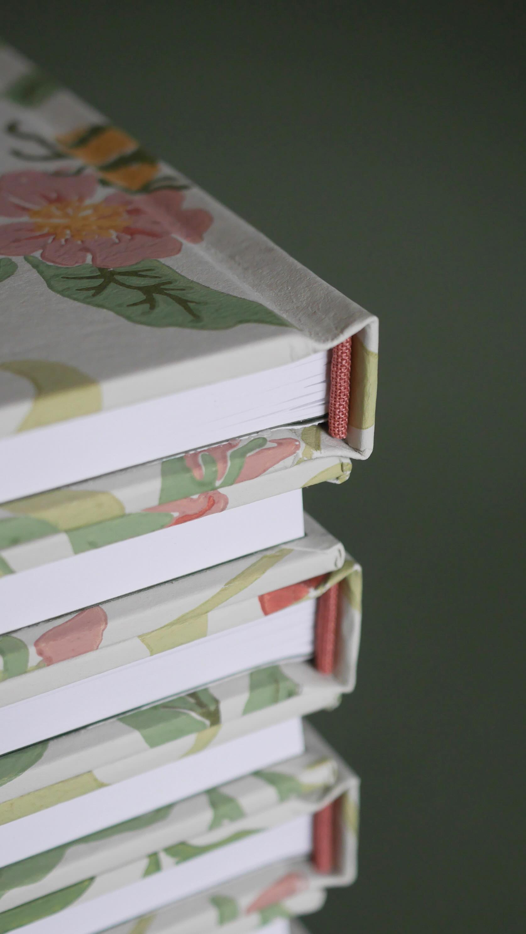 At it again! ✂️ Making bespoke notebooks out of my favourite covering material… Can you guess?!