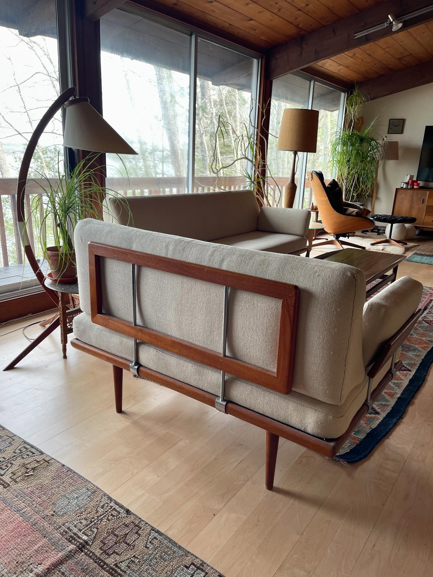UPDATE - SOLD: Iconic Minerva sofa / daybed by renowned Danish design duo Peter Hvidt & Orla Mølgaard-Nielsen, c. 1960s. Manufactured by France & Daverkosen (later France & Son). The 2 piece sofa impresses with its solid teak frame with tapered legs and characteristic side armrest, supporting upholstered cushions. The original wool upholstery is in a light, cream tone, emphasizing the timeless, high-quality character of the design. Good to very good vintage condition. The teak wood shows a beautiful, even patina with one repair to a leg joint on the shorter section (pictured). The fabric is in good condition, with some light spotting on the larger section. The upholstery is firm and the seating comfort is reasonable considering its age. Non-smoking item. Only two owners.
Arms can be switched to change the orientation from left facing to right facing, to one solid length, or to a sofa with two arms and an armless one.
Longer section measures:
Back height 32.5”
Length 75”
Depth 30”
Seat height 16”
Shorter section measures:
Back height 32.5”
Length 53”
Depth 30”
Seat height 16”
DM for extra details or to purchase. FCFS, serious inquiries only. Local purchase only, delivery within 2 hours of Portland available for an extra fee.
Sending care and kindness to each of you wherever you are, especially the people of the world caught in the crosshairs of unjust w@rs and imperi@lism. ✨ 10% of proceeds from this sofa will go to aid for displaced people from Lebanon and Iran.