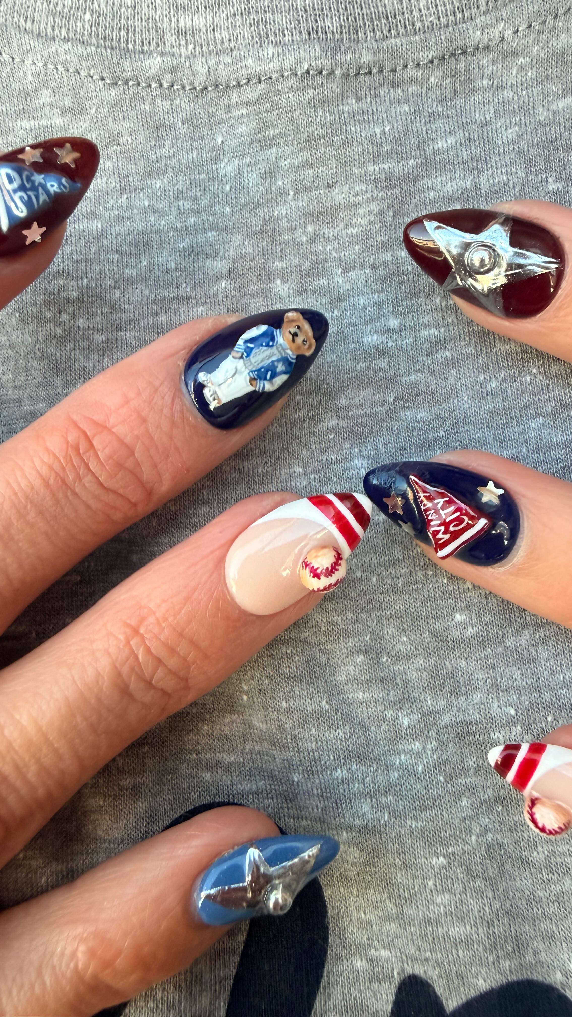 Ralph Lauren 🤝 Nails
I am so obsessed with this lil guy and quite honestly surprised myself with how perfect he turned out
This nail goes with a sports themed set that I made for my friend @nichelle.sharer to wear while she interviewed some of our fav sports romance authors
If you look closely, the bear’s letterman jacket has an “N” for a Nichelle. It’s making those tiny details and personalizations that make me love custom nails sets.
Not to mention he’s literally wearing a cable knit sweater 😭
One of my favorite nails to date 💙
#polobear #nailinspo #nailideas