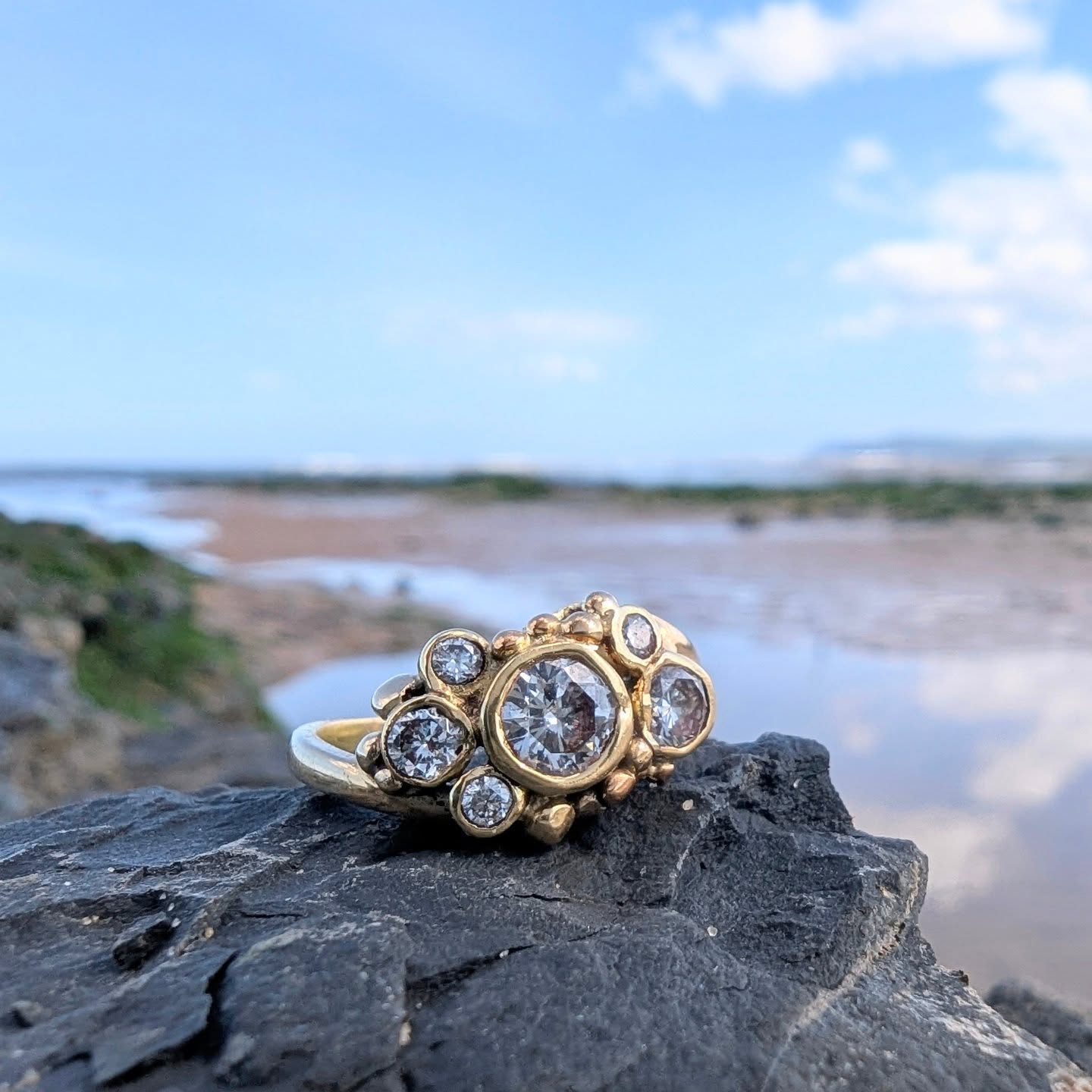 Beautiful day at the beach today collecting a few fossils and mucking about in rock pools...I took the opportunity...as the weather was so beautiful, to do a little "on location" photography of a yet to be launched ring...no name yet for it so please let me know your suggestions below 👇.
The ring features six diamonds, totalling 1.5 carats and is in 18ct gold, definitely an heirloom piece.
#heirloomjewellery #oneofakindjewellery #custommadering #engagementringideas #rockpooljewellery