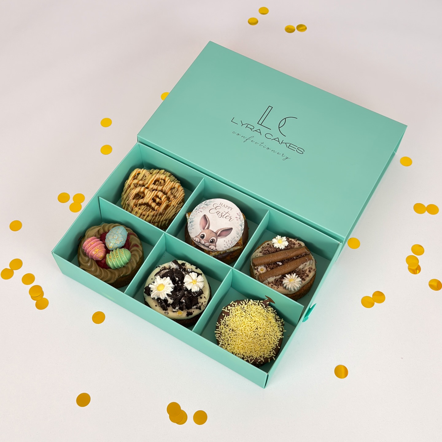 Easter Lyra Signature Cookie Box
A festive box of six signature cookies made with premium ingredients and real Belgian chocolate, includes Salted Caramel Crunch, American Classic, Bueno, Pistachio Raspberry, Oreo, and Nutella, perfect for gifting or enjoying a variety of flavors in one box 🐣✨