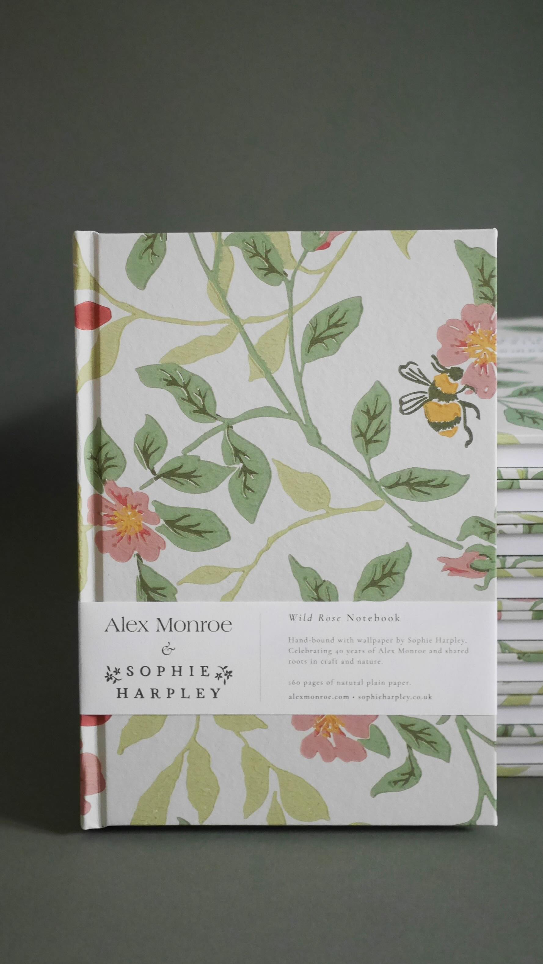 🌷🐝 A heavenly project for two of my favourite designers @sophieharpley and @alexmonroejewellery - I created a limited edition of notebooks handbound in wallpaper for the launch of their new wallpaper, ‘Wild Rose’. Celebrating 40 years of @alexmonroejewellery and shared roots in craft and nature. I love the bumble bee, honeysuckle and wild rose!