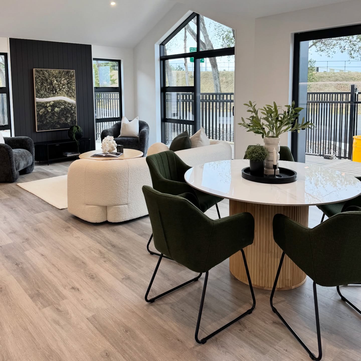 Every item has its place and purpose.
1. Angular window structure and straight lines is softened with curved furniture.
2. A monochromatic interior is injected with a smart complimentary colour.
3. Round tables are used to allow easy movement between furniture zones
Staging is about answering buyers questions without them even needing to question them ✔️