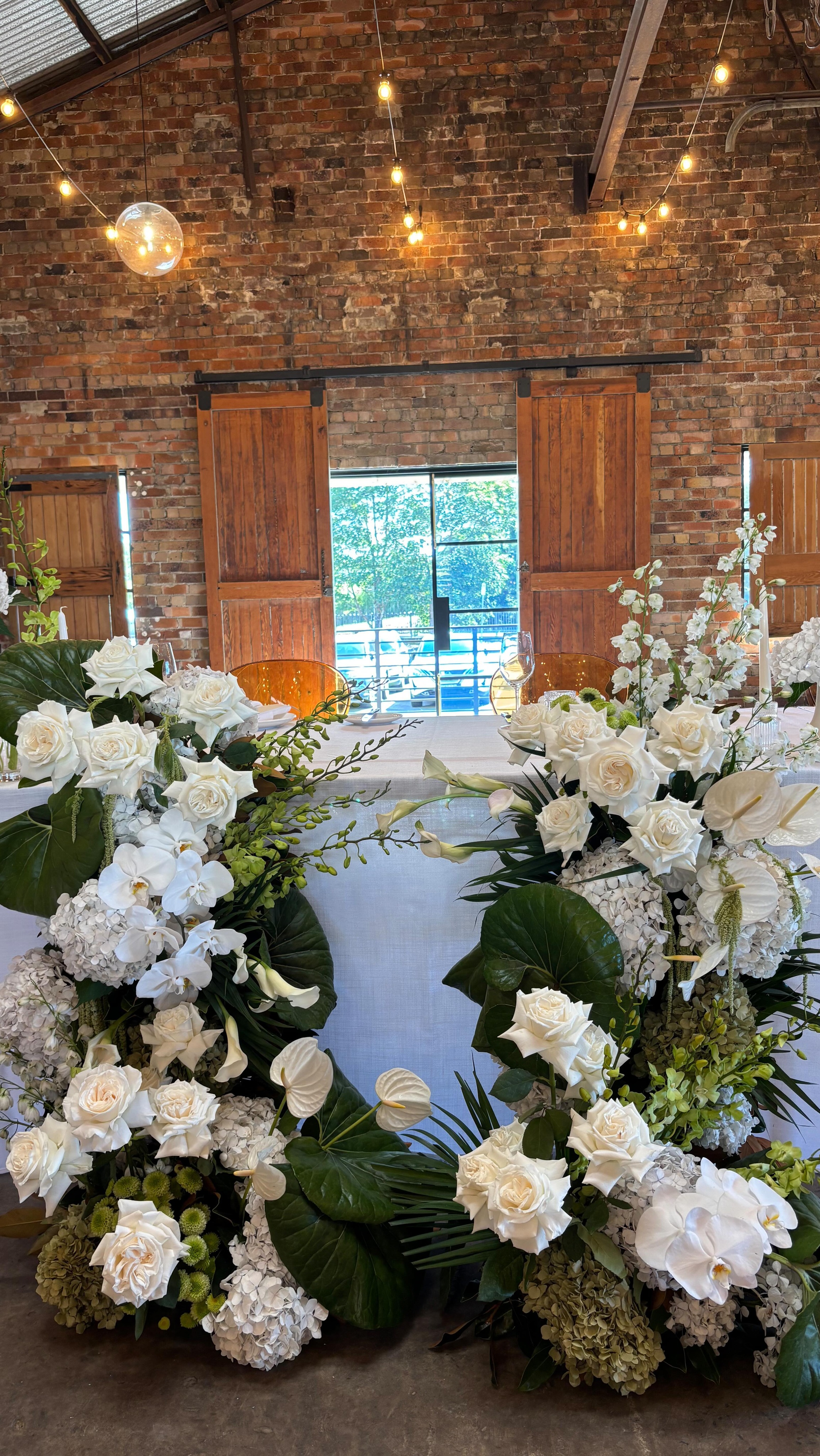 The most stunning repurpose for Ebonee and Jay. Lots of interesting texture and premium florals, creating a stunning ceremony backdrop, and then an epic tablescape at the reception 🤌 venue @thecoopgerringong