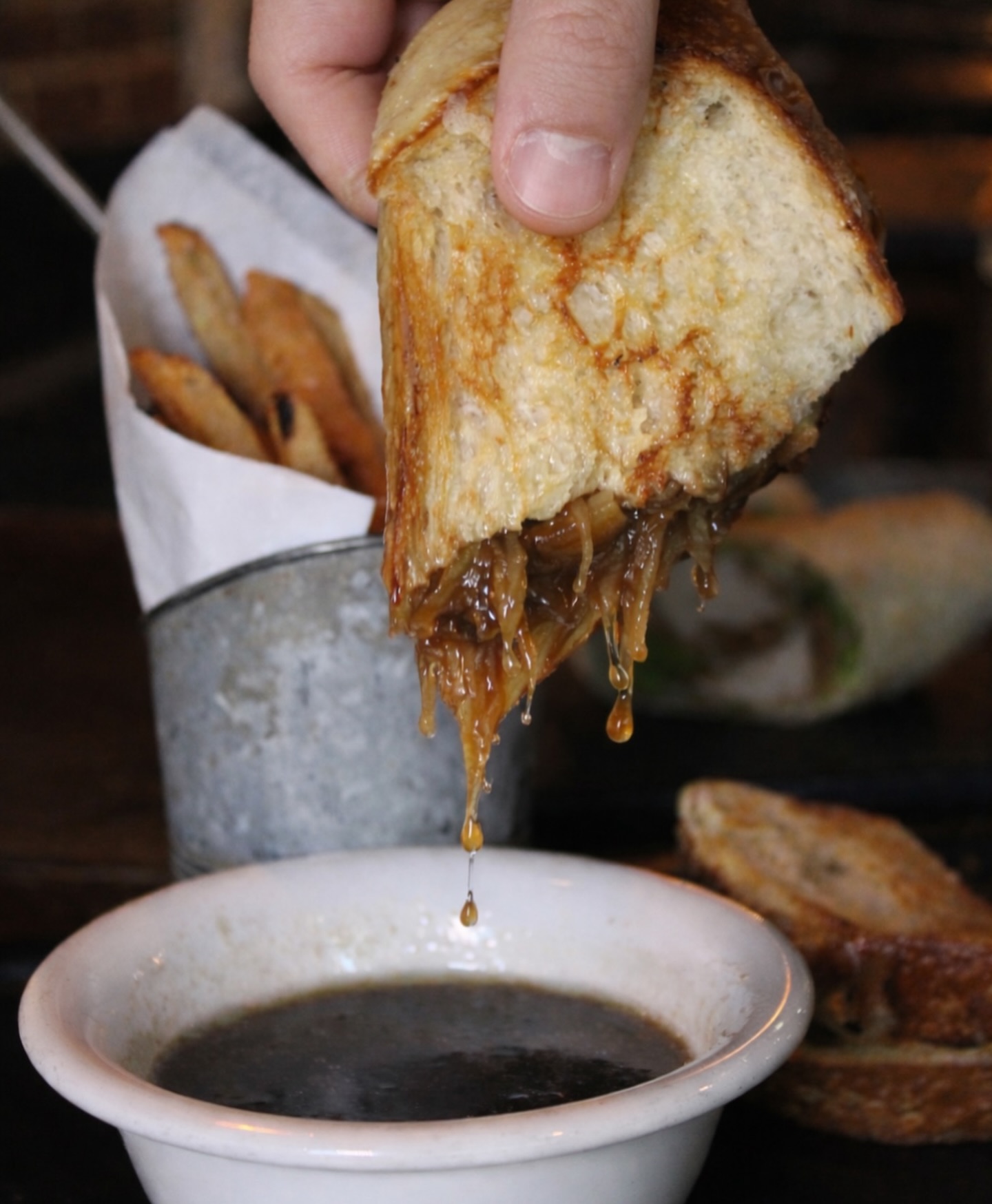 French Onion Grilled Cheese, but make it unreal 🧅🧀🔥
Golden, buttery bread packed with melted cheese and rich caramelized onions, served with a side of au jus for the perfect dip. This is comfort food done right and easily one of the most underrated lunch picks on the menu.
Now part of our Smash Lunch Menu, available at select Burgerology locations for a limited time Monday–Friday from 11:30AM–3PM.