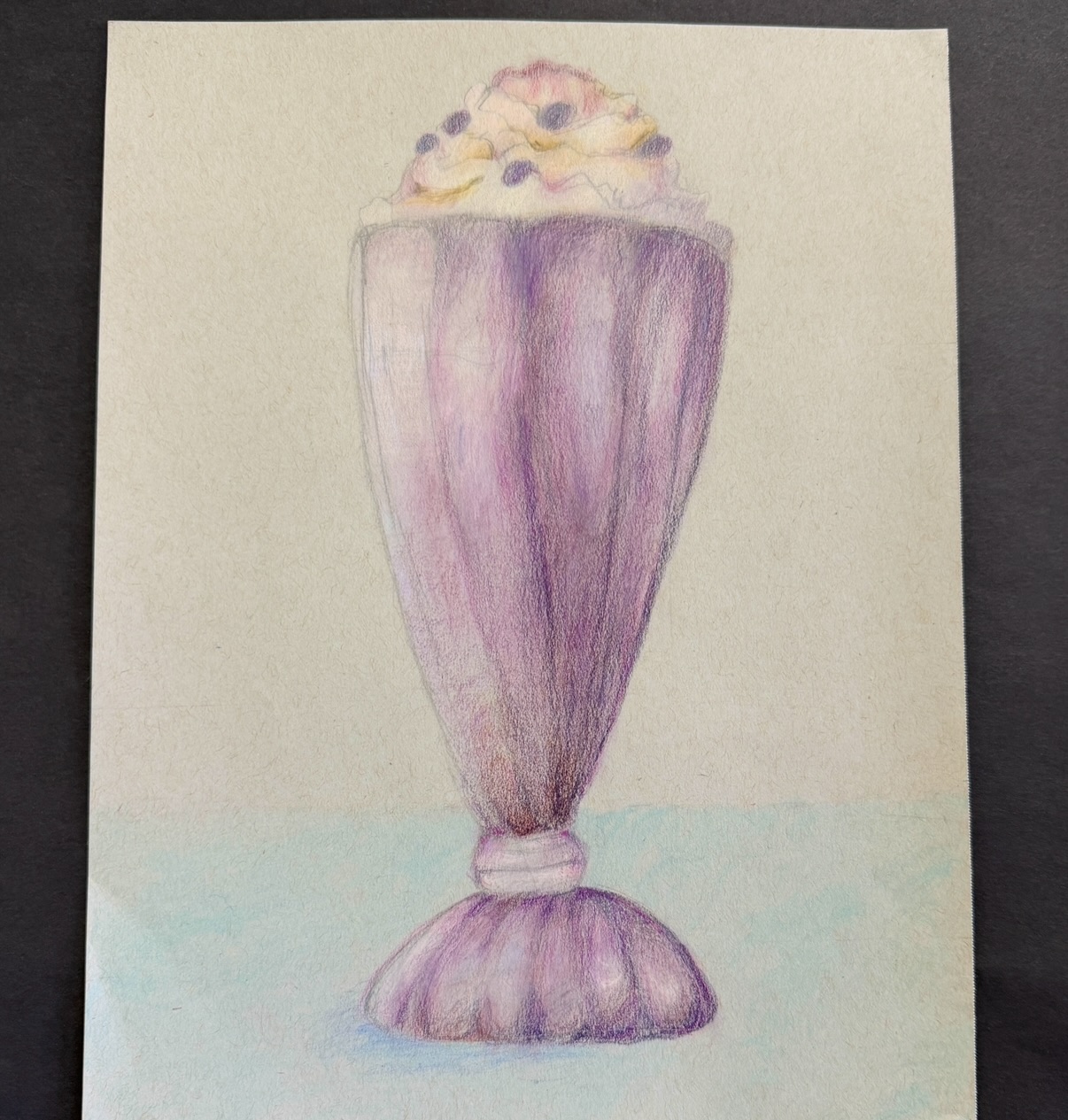 This milkshake glass didn’t come from a shortcut — it started with careful observation and grew, layer by layer, through color theory, patience, and the willingness to keep trying. ✏️🎨
The artist is 12. This is what can happen when a young person is given the space, the tools, and the permission to grow. Art education isn’t a luxury. It teaches kids to slow down, look closely, make decisions, and trust the process — skills that go far beyond the paper, beyond the art room and well into life. ✨
#ArtEducation #YoungArtist #ColorPencilArt #ObservationalDrawing #ArtAdvocacy