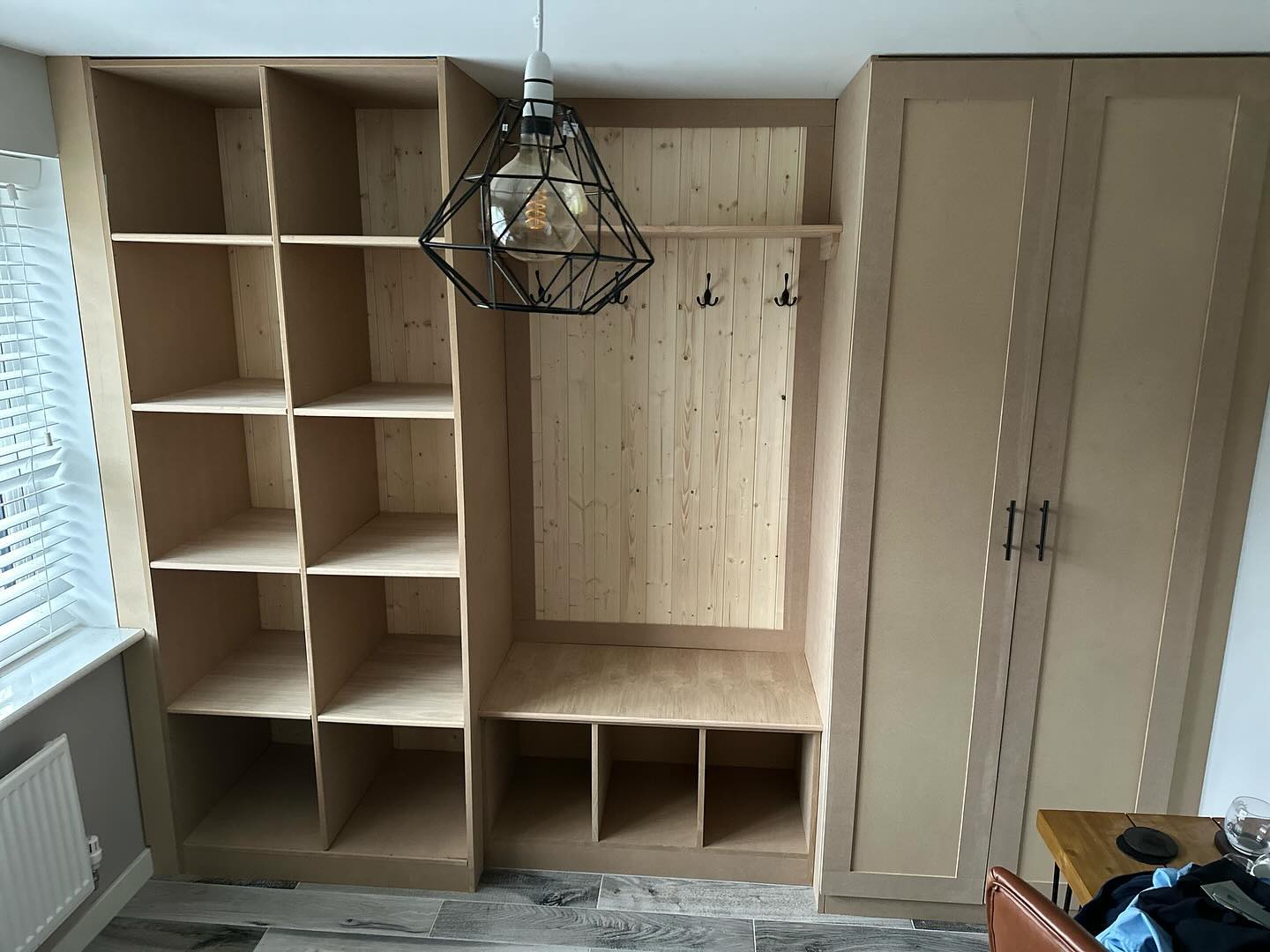 Boot room unit fitted recently with oak shelves and seating